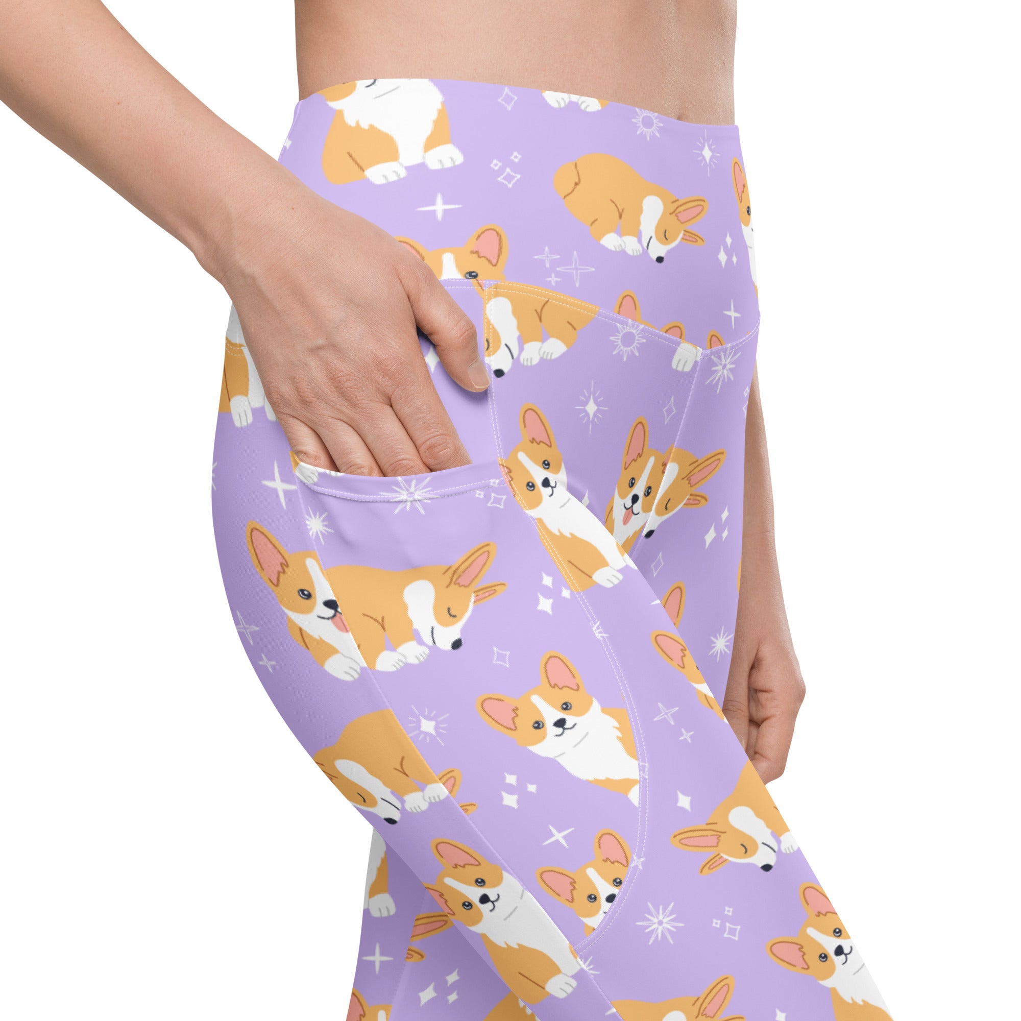 Women’s purple high-waisted corgi dog yoga leggings with pockets featuring orange and white corgi pattern and starbursts