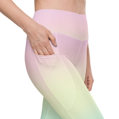 Women’s high-waisted pastel rainbow yoga leggings with soft compression and side pockets for active wear