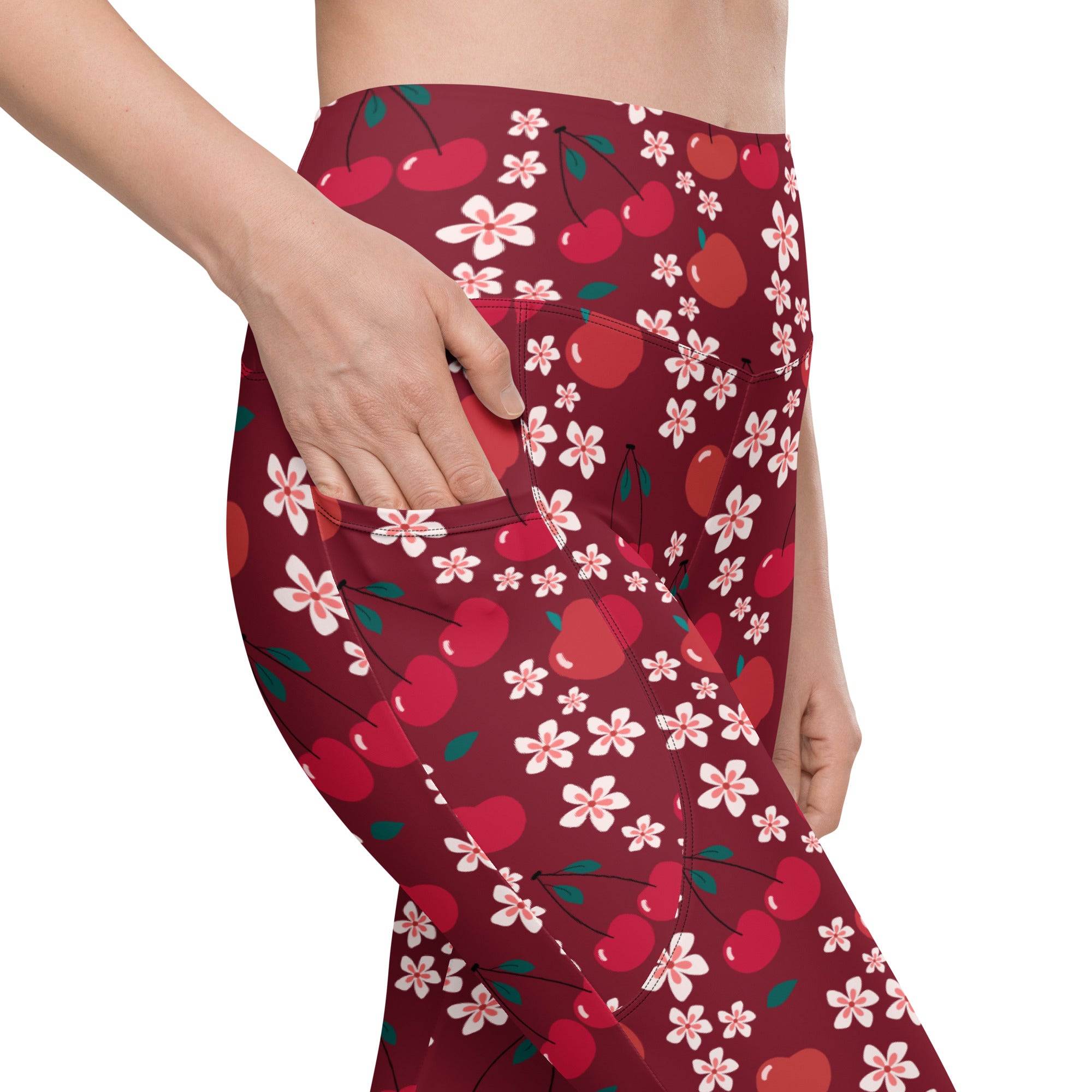 Women’s high-waisted maroon cherry blossom yoga leggings with pockets featuring vibrant red cherries and pink blossoms