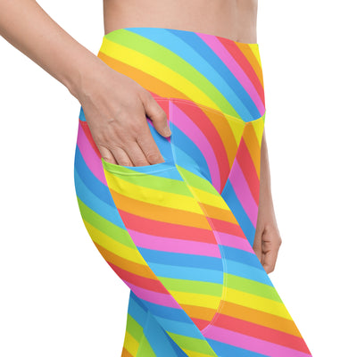 Women’s rainbow stripe high-waisted leggings with pockets featuring vibrant neon swirling pattern and soft compression fabric