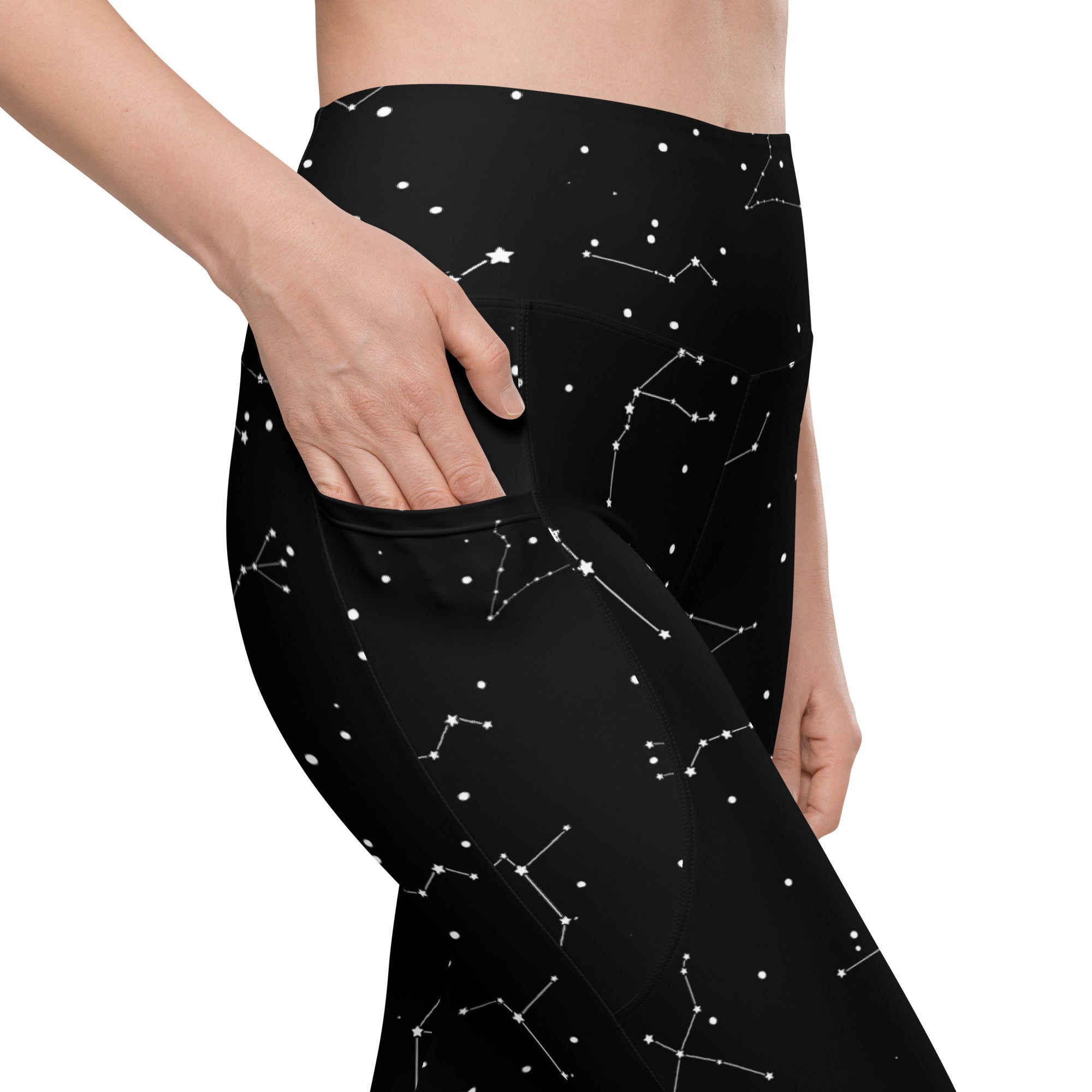 Black high-waisted women’s yoga leggings with white constellation star pattern soft compression and pockets