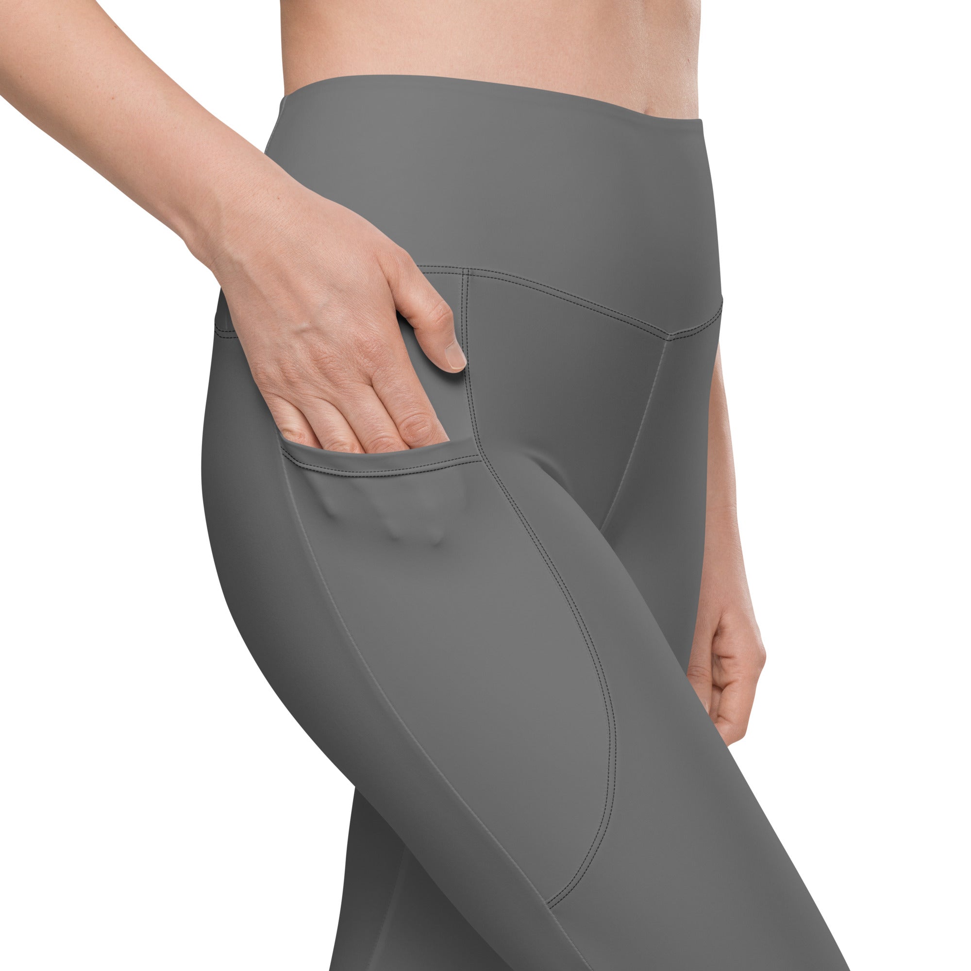 Women’s gray high-waisted yoga leggings with side pocket made from soft compression fabric for active wear