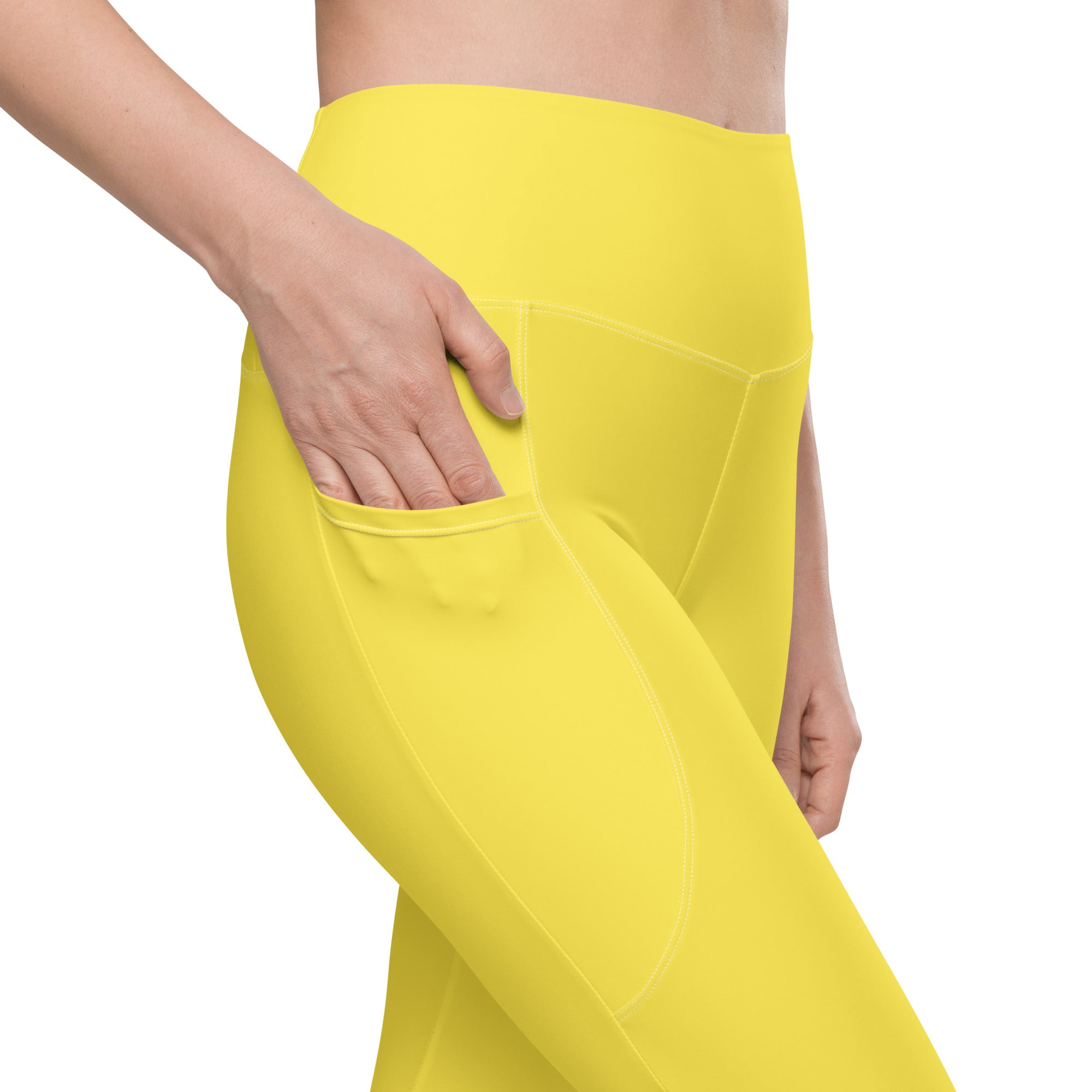 Women’s yellow high-waisted yoga leggings with smooth stretchy fabric and side pocket for soft compression activewear