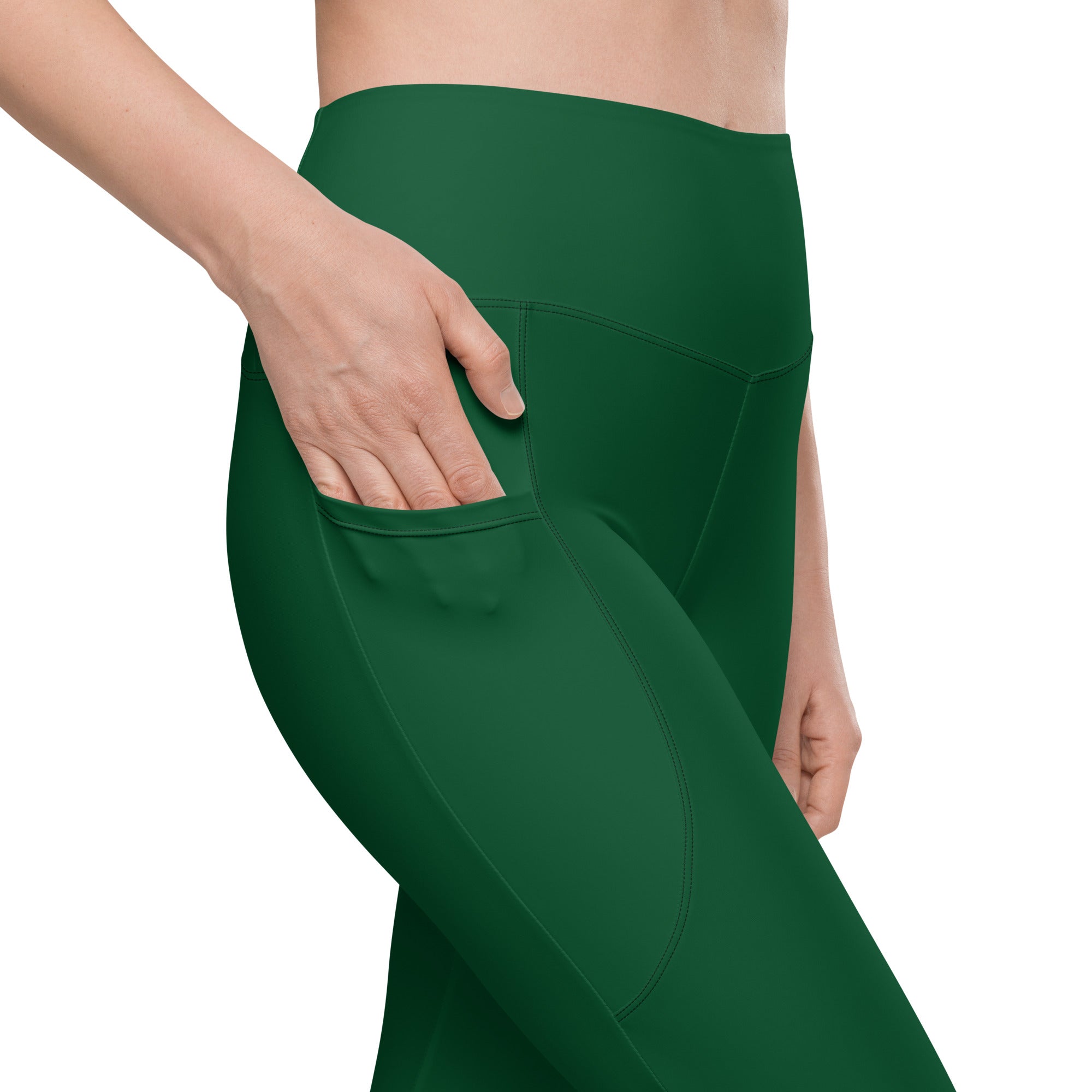Women’s dark green high-waisted yoga leggings with pockets made of smooth stretchy soft compression fabric