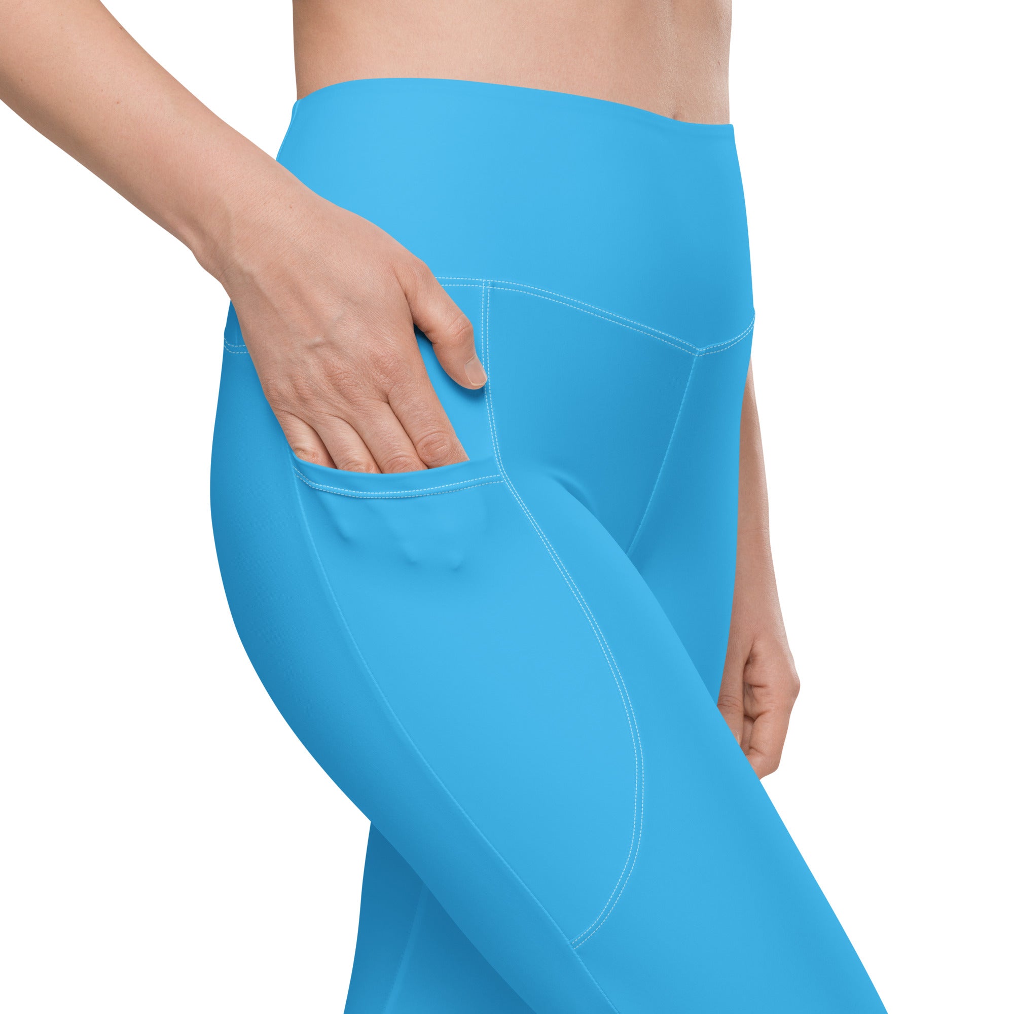 Women’s bright blue high-waisted yoga leggings with soft compression fabric and visible side pockets for active wear