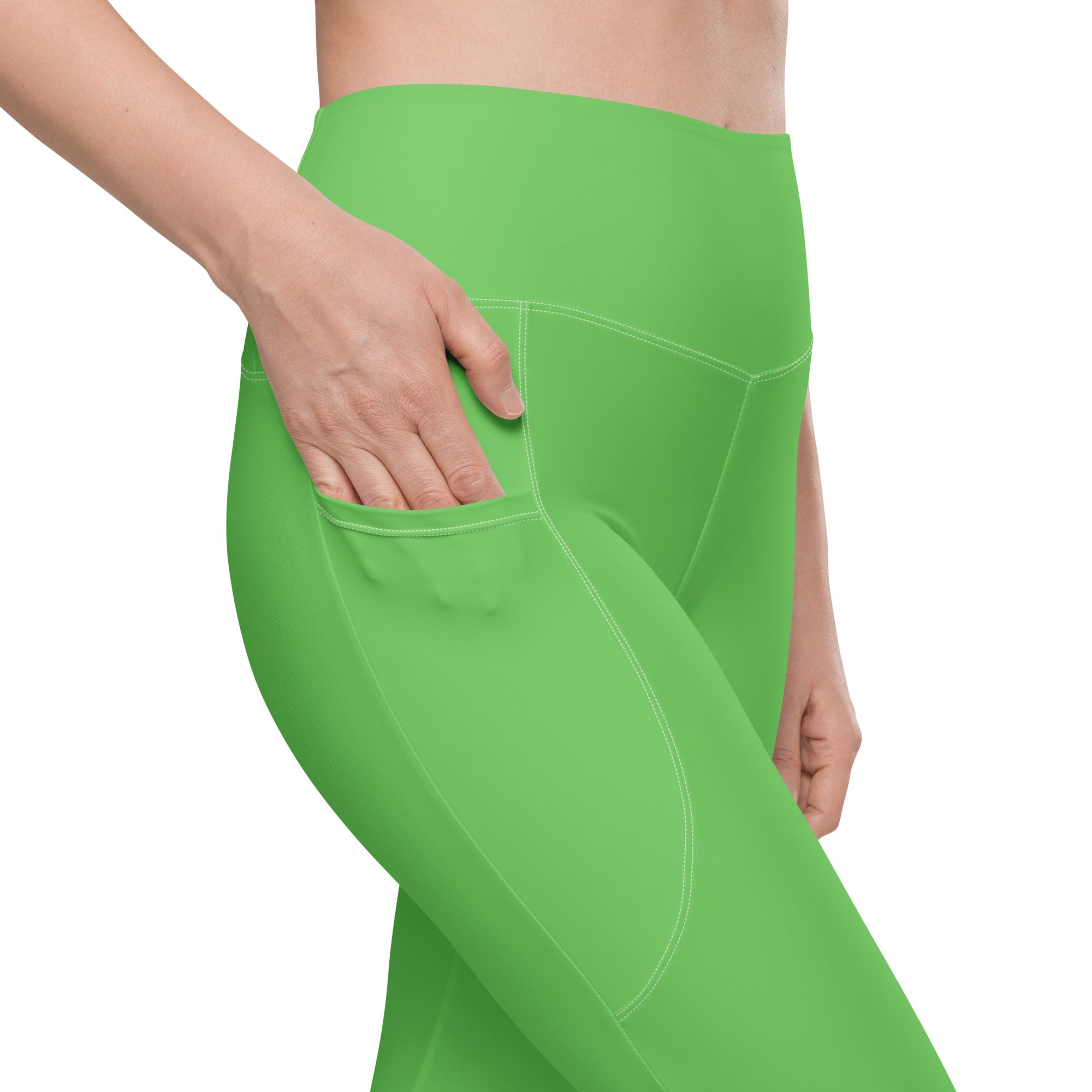Bright green high-waisted women’s yoga leggings with side pocket soft compression and subtle seam detailing