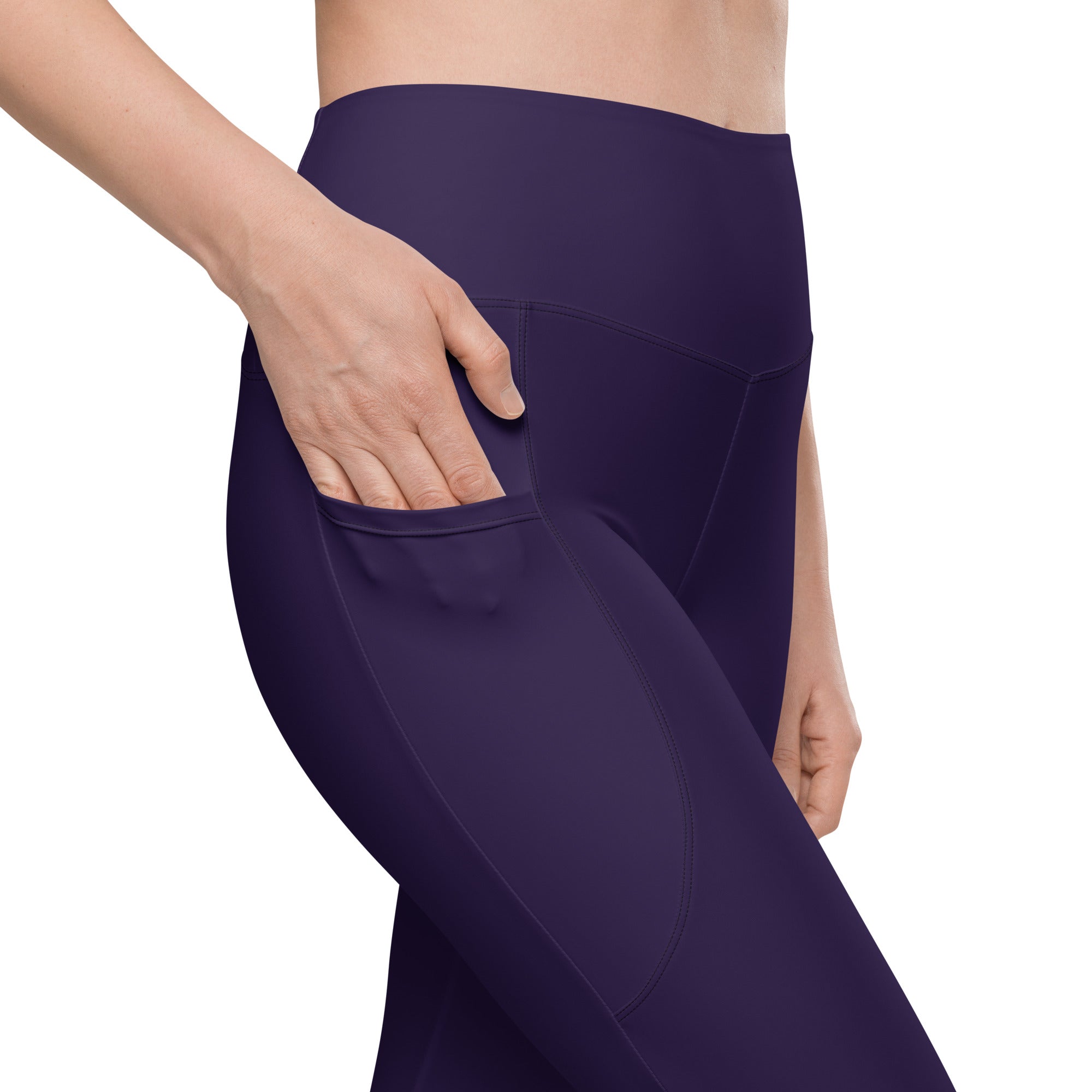 Women’s dark purple high-waisted yoga leggings with soft compression fabric and a convenient side pocket