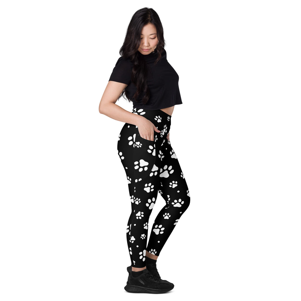 Women’s black paw print yoga leggings with pockets high waisted soft compression active pants showing front view
