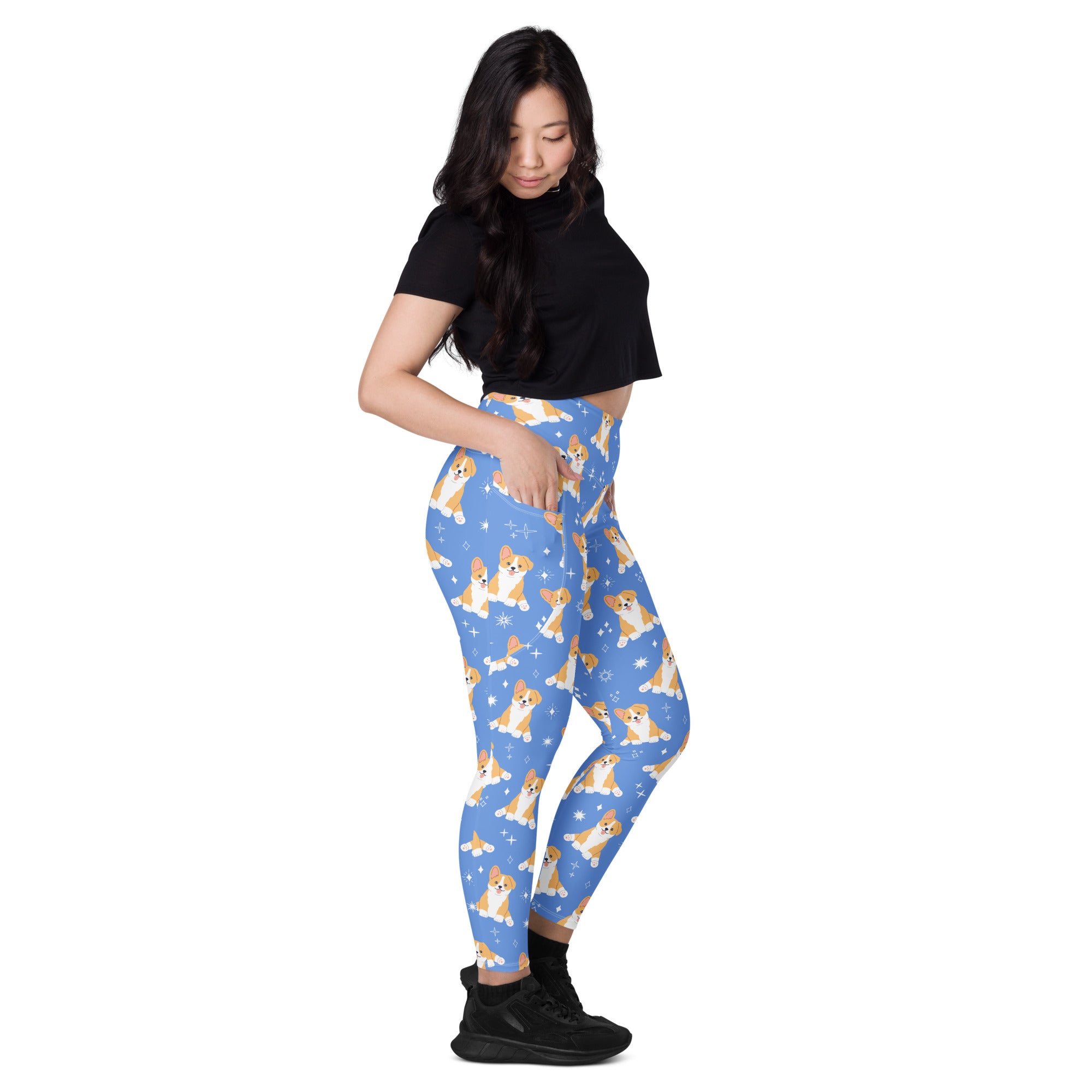 Women’s blue high-waisted soft compression yoga leggings with pockets featuring a playful corgi and sparkle pattern