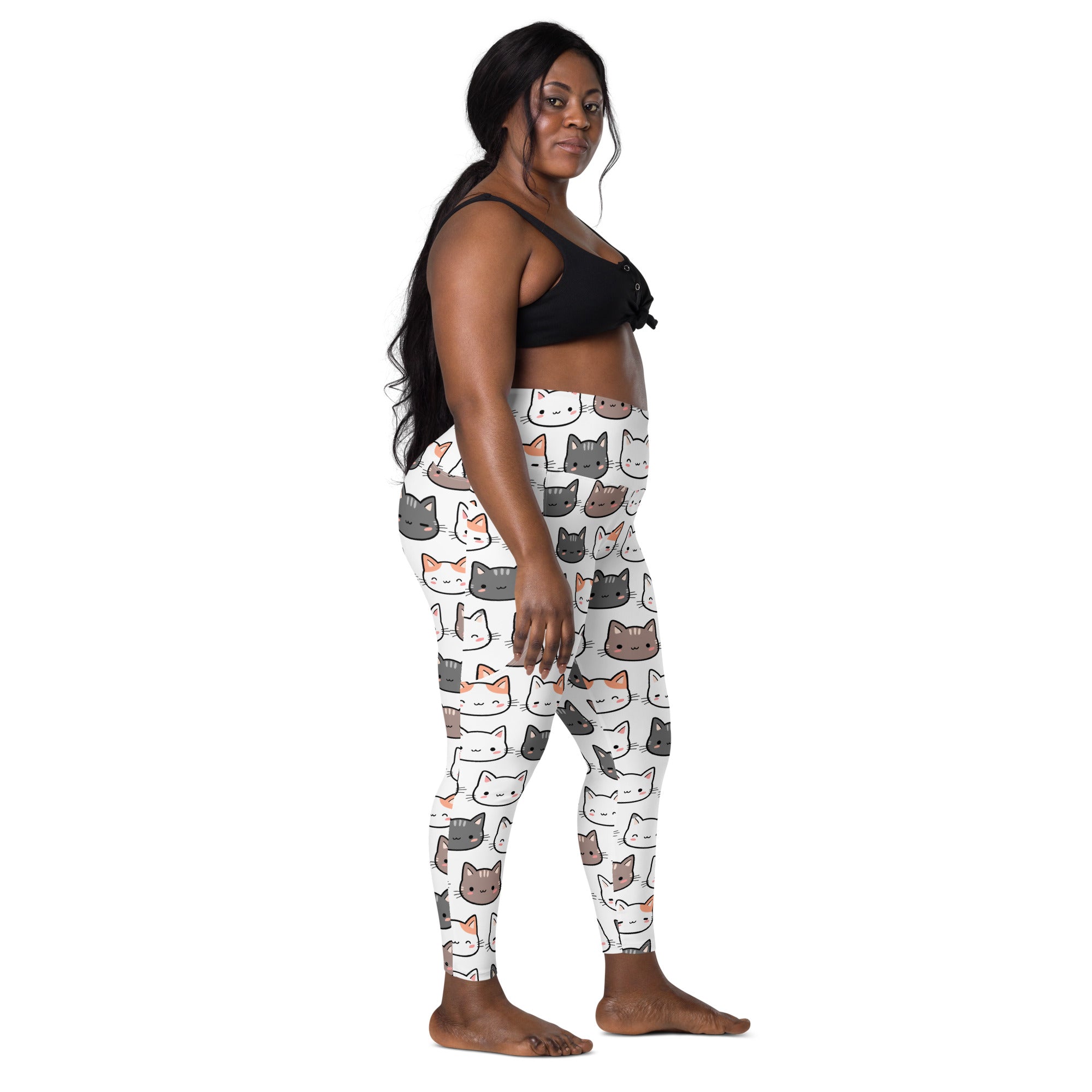 White high-waisted yoga leggings with soft compression featuring colorful cartoon cat patterns and pockets