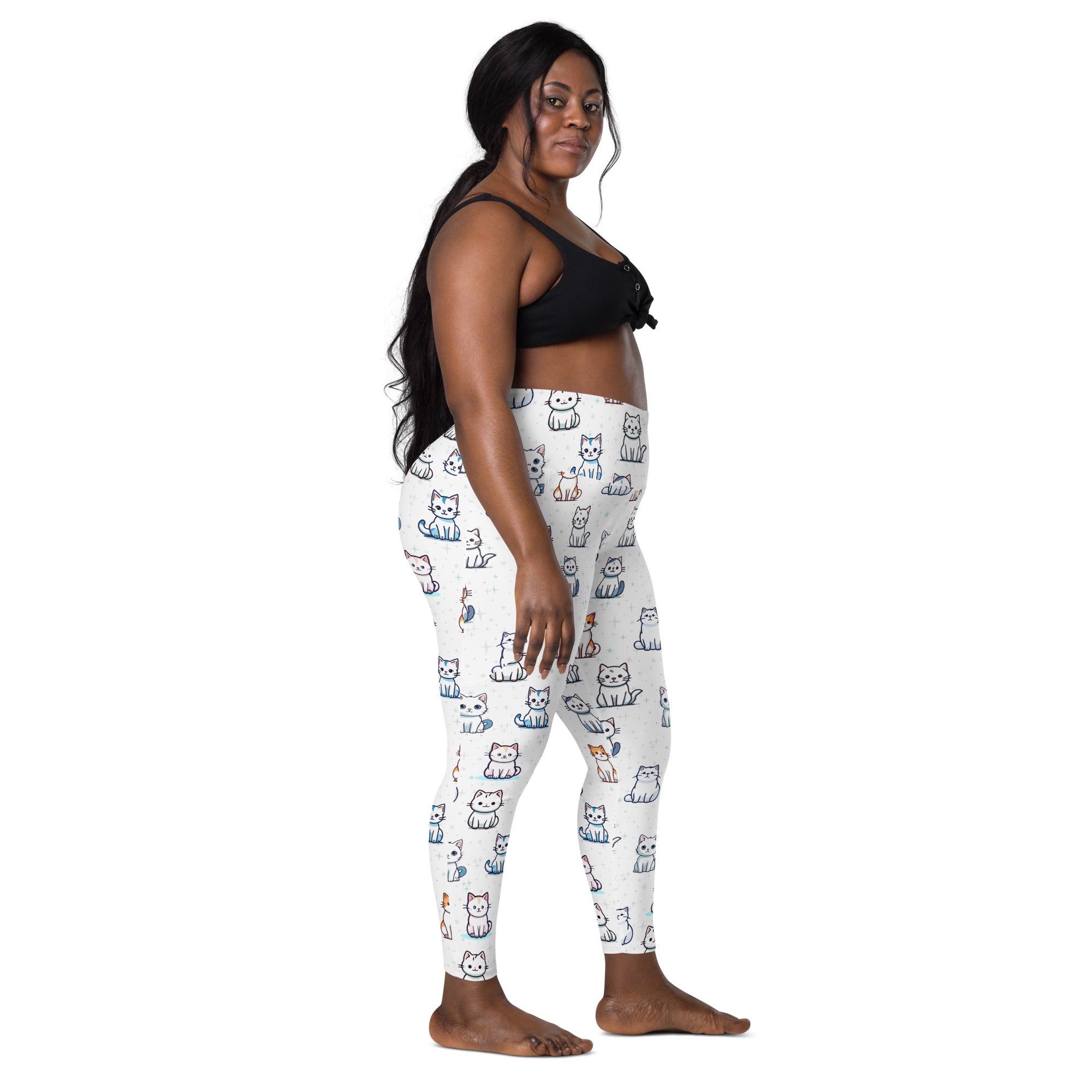 White women’s cute kitten yoga leggings with pockets featuring colorful cartoon cat pattern and soft compression fabric
