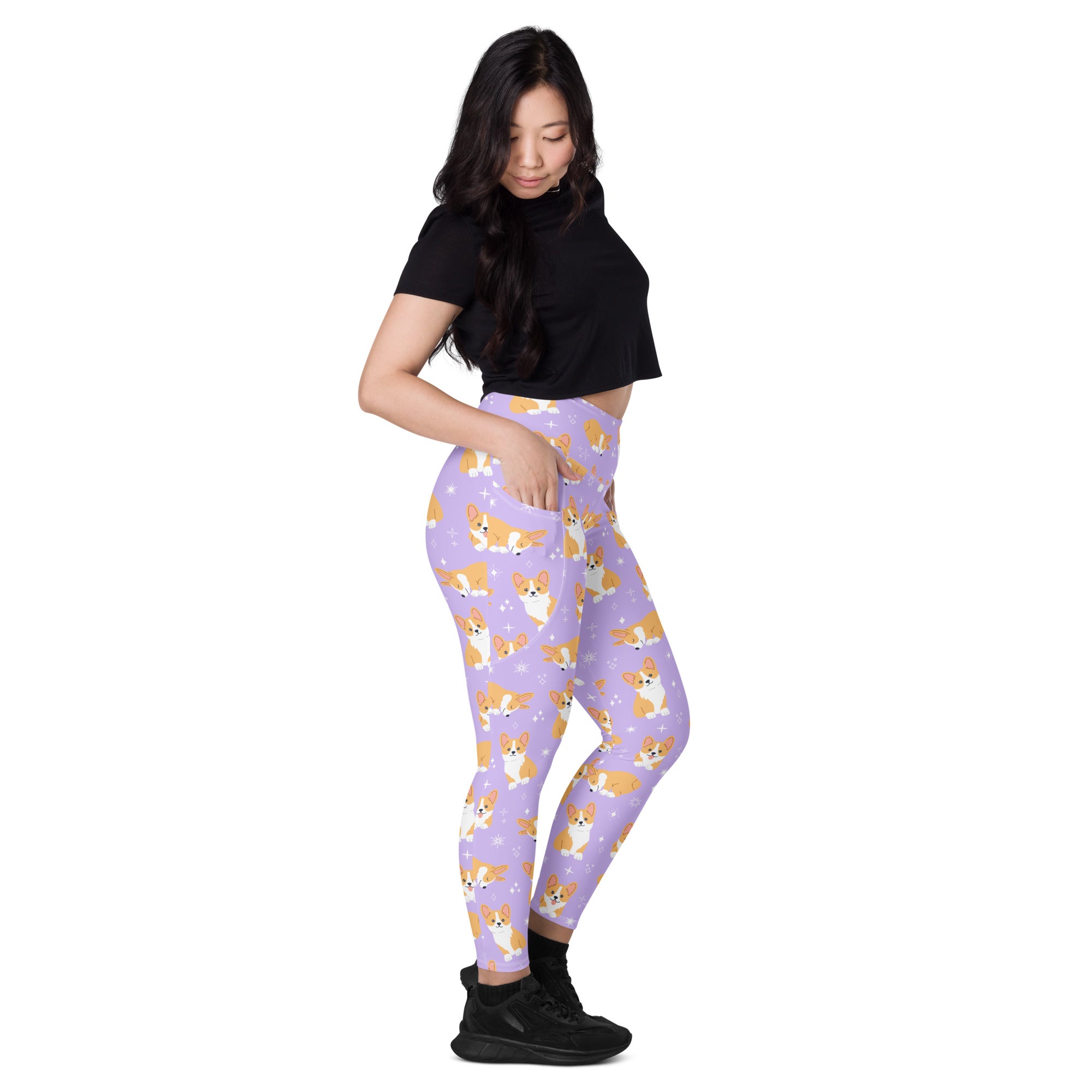 Women’s purple high waisted corgi dog yoga leggings with pockets featuring orange and white corgi pattern and stars