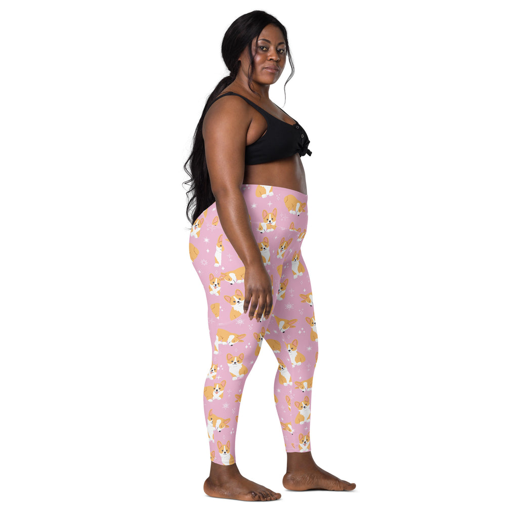 Women’s pink high-waisted corgi dog yoga leggings with pockets featuring a soft compression fabric and playful tan and white corgis
