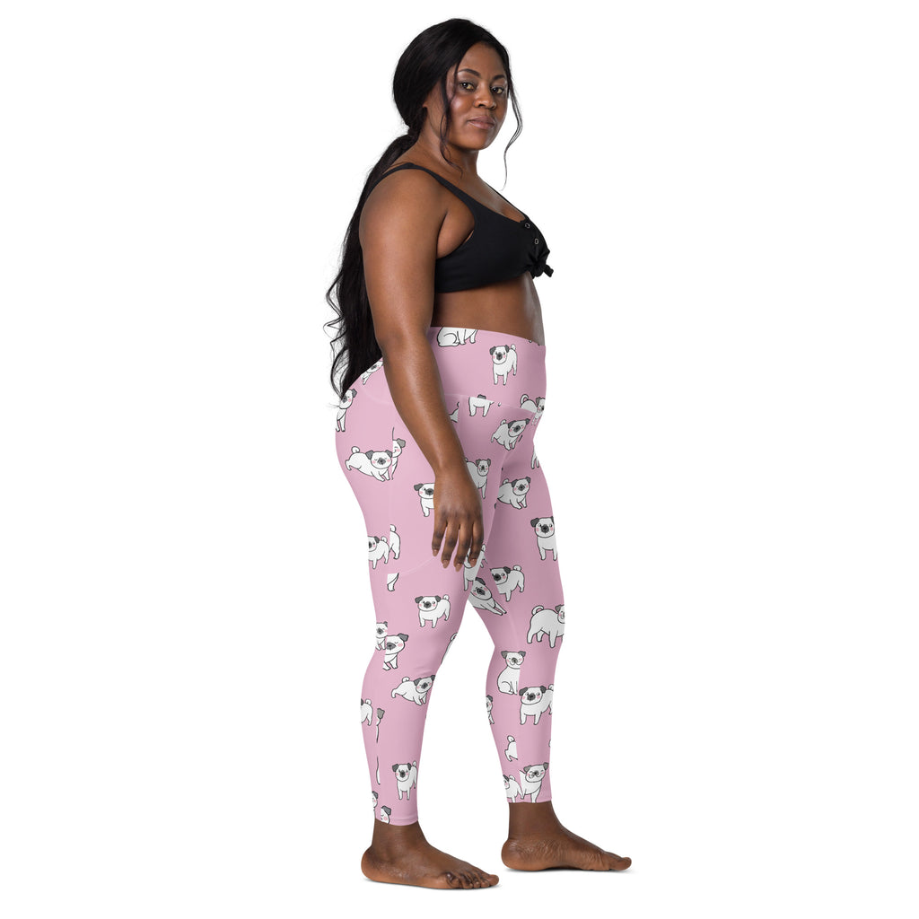 Women’s pink high-waisted soft compression yoga leggings with pockets featuring a repeating white pug dog pattern