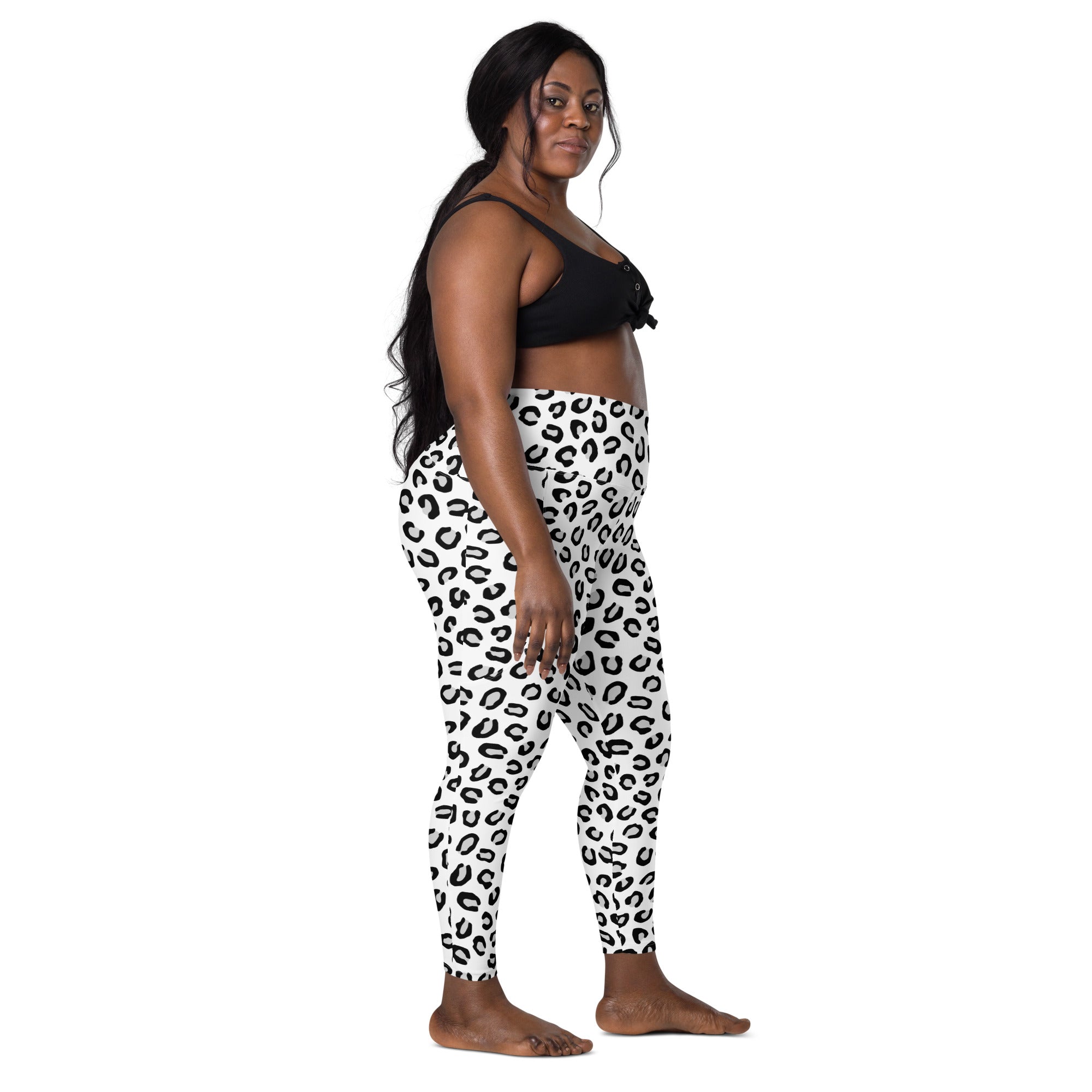 Women’s high-waisted black and white leopard print yoga leggings with pockets soft compression active pants