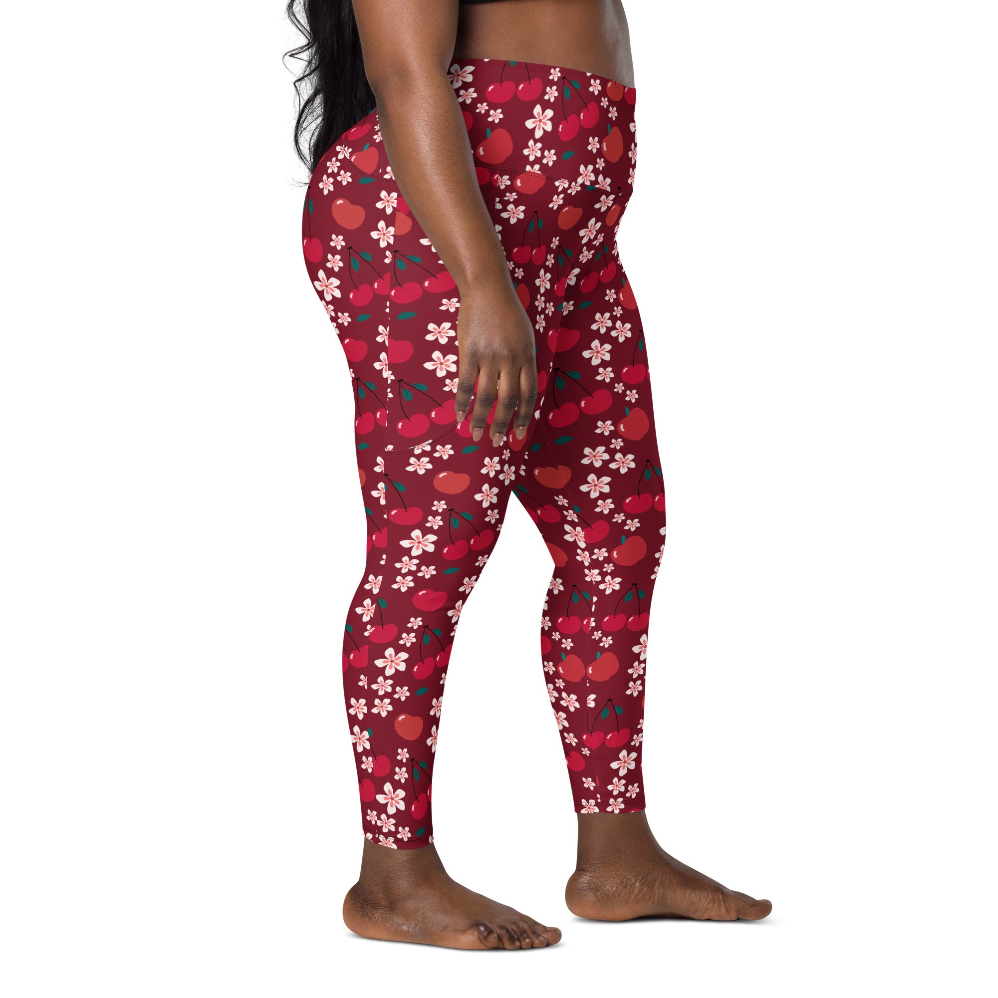 Women’s high-waisted cherry blossom yoga leggings with pockets featuring red cherry and white flower pattern