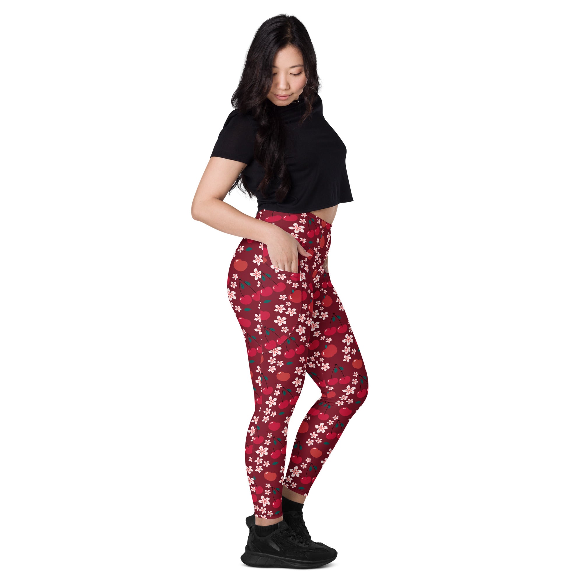 Women’s high-waisted red cherry blossom yoga leggings with white flower and red apple pattern and pockets