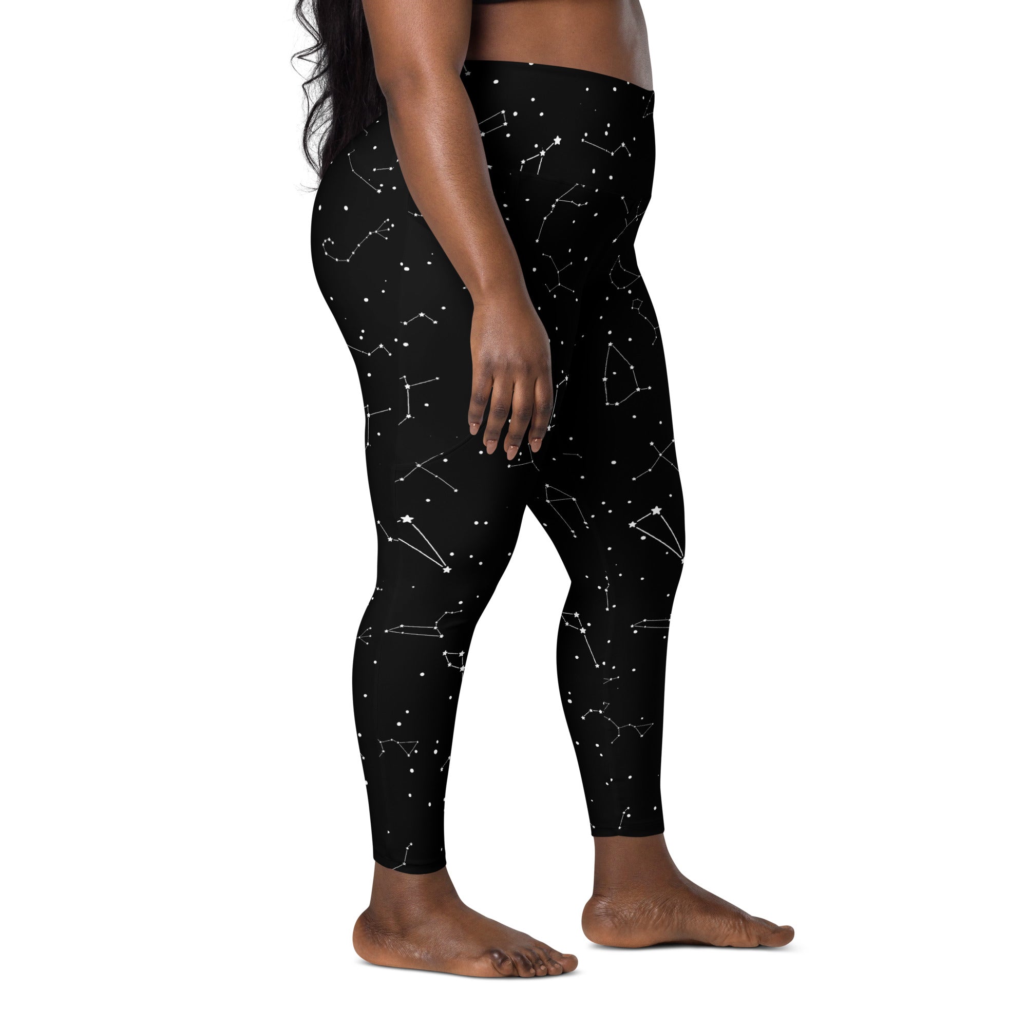 Black women’s high-waisted leggings with white constellation pattern soft compression and pockets for yoga