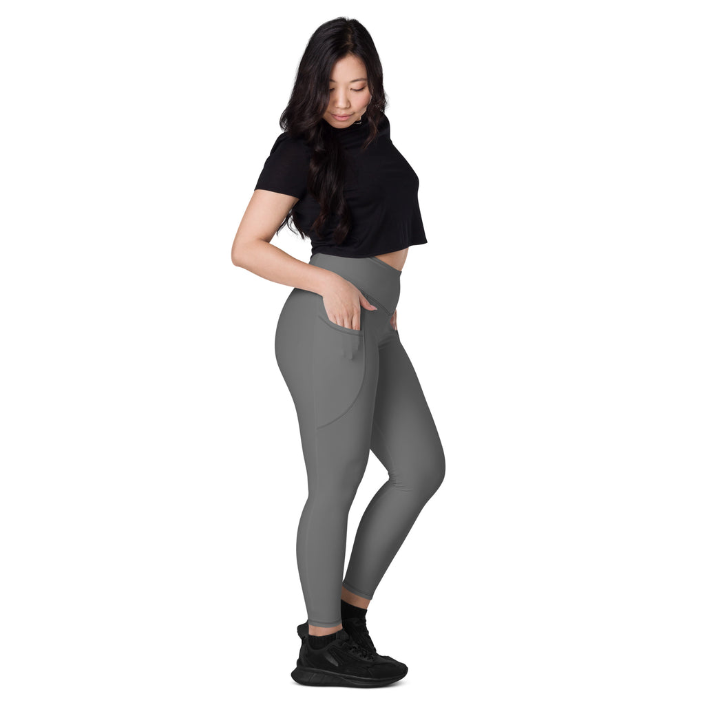 Women’s gray high-waisted yoga leggings with soft compression and side pockets for active wear