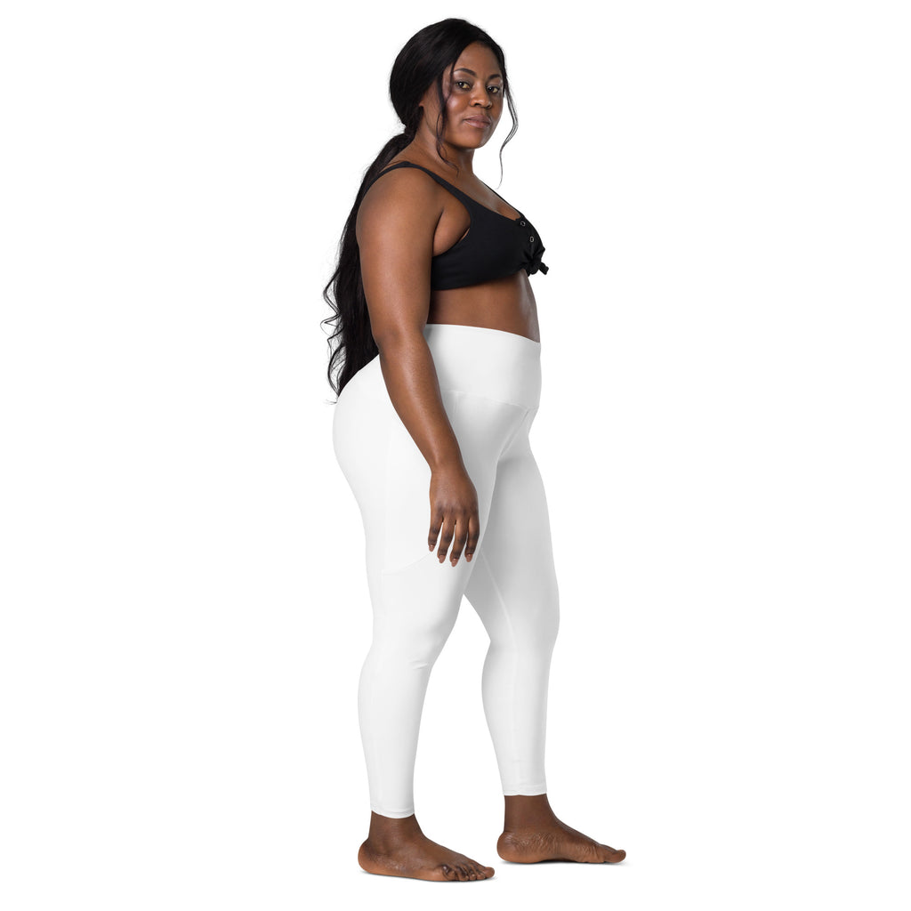 Women’s white high-waisted yoga leggings with pockets made of soft compression fabric for active wear