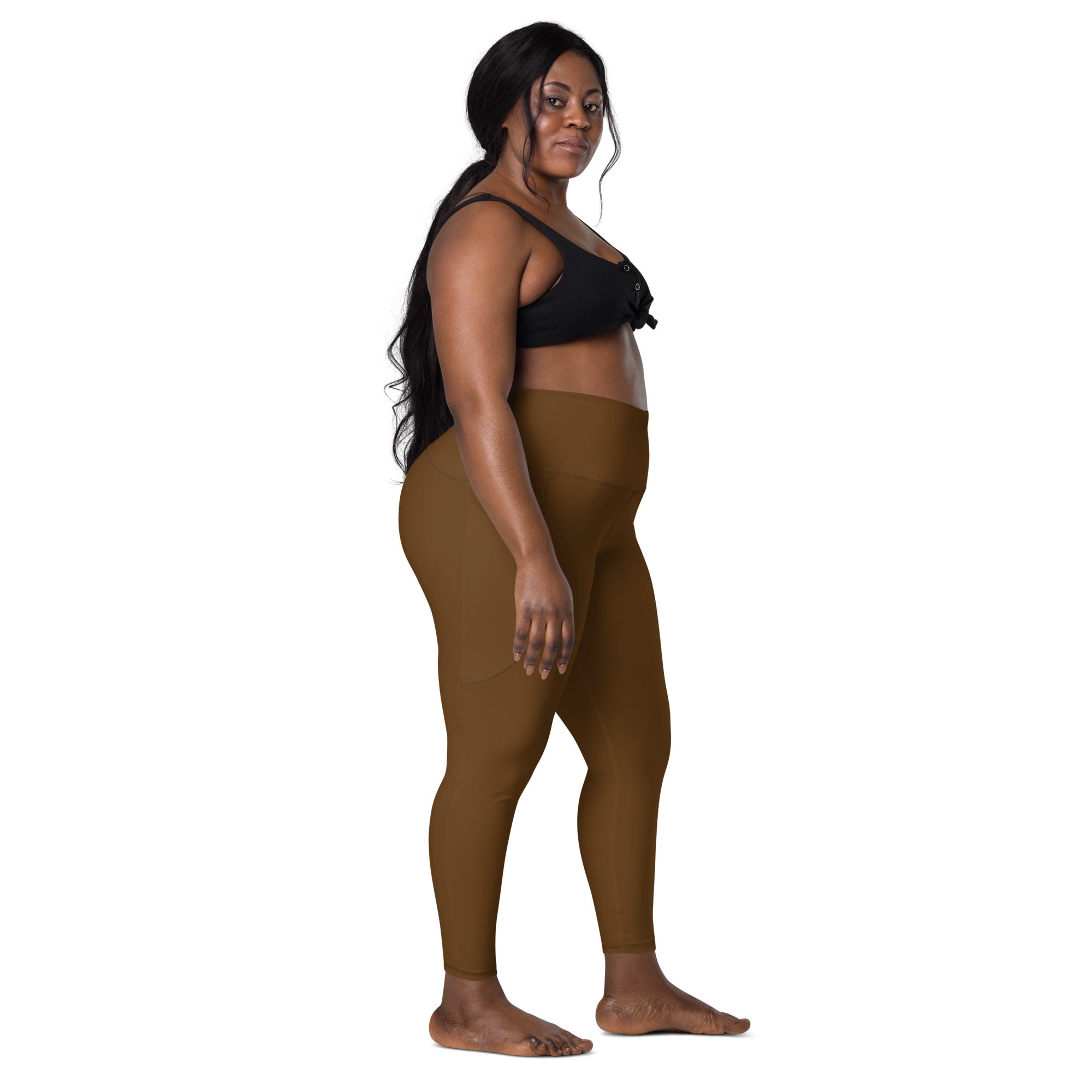 Women’s brown high-waisted yoga leggings with pockets made from soft compression fabric for active wear