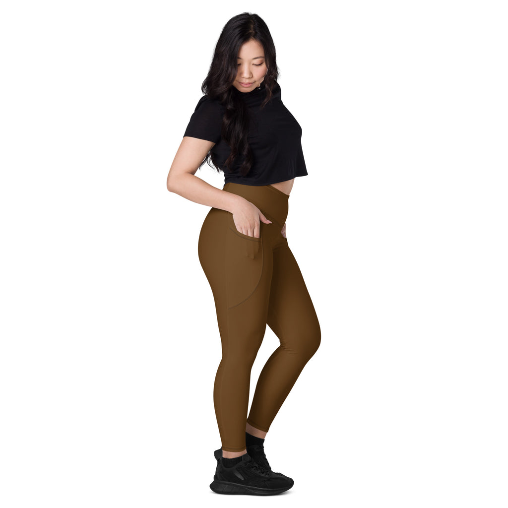 Women’s brown high-waisted yoga leggings with pockets and soft compression in form-fitting fabric with side seam detailing