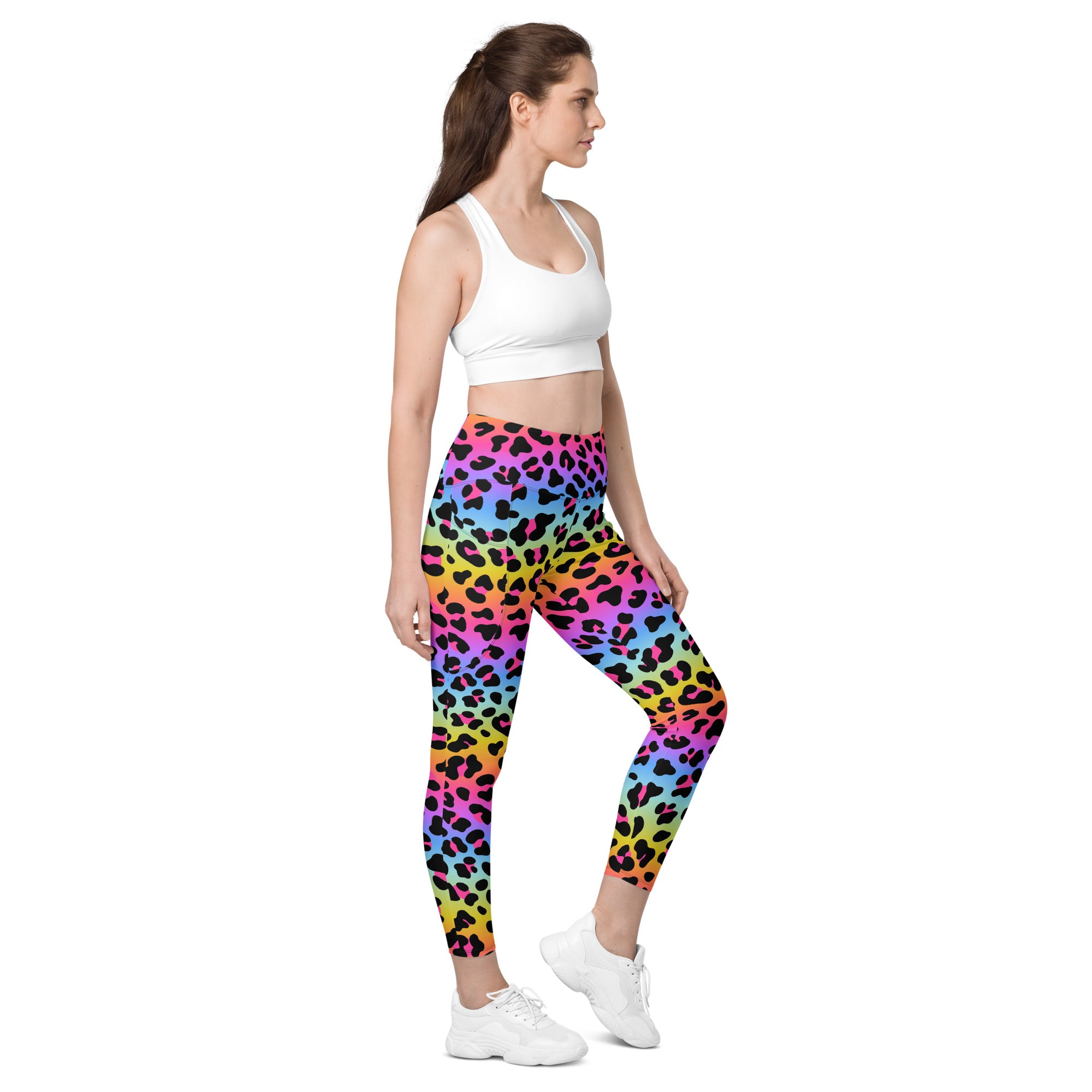 Women’s high-waisted rainbow leopard yoga leggings with black spots soft compression and pockets shown from the back