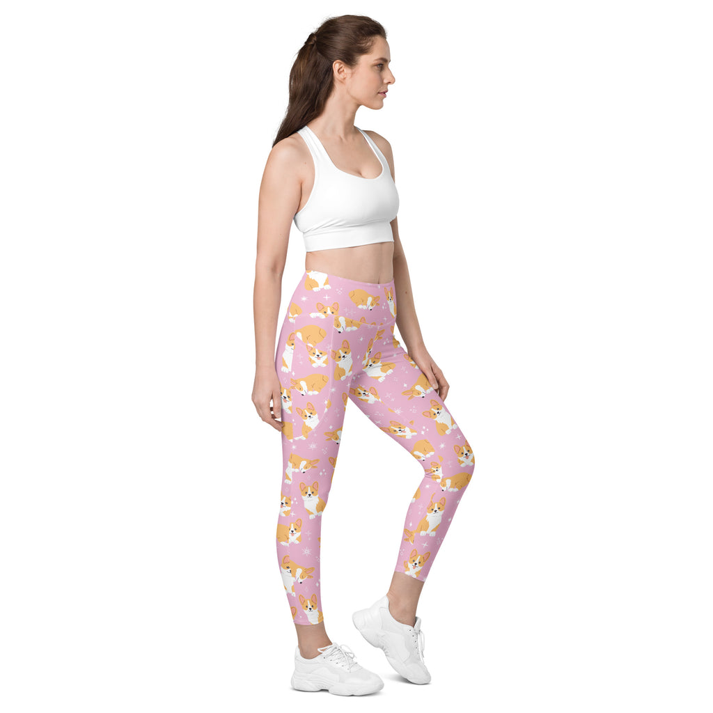 Women’s pink high waisted yoga leggings with pockets featuring soft compression and cartoon corgi dog pattern