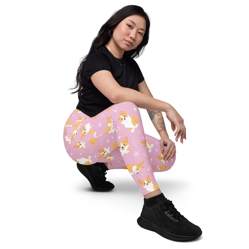 Women’s pink high-waisted corgi dog yoga leggings with pockets featuring a playful cartoon corgi pattern