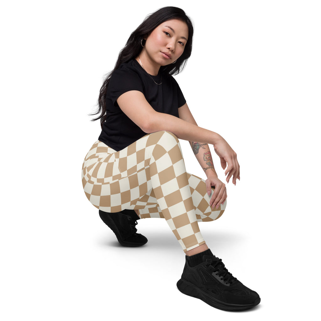 Women’s cream and white checkered high-waisted yoga leggings with pockets and soft compression fit