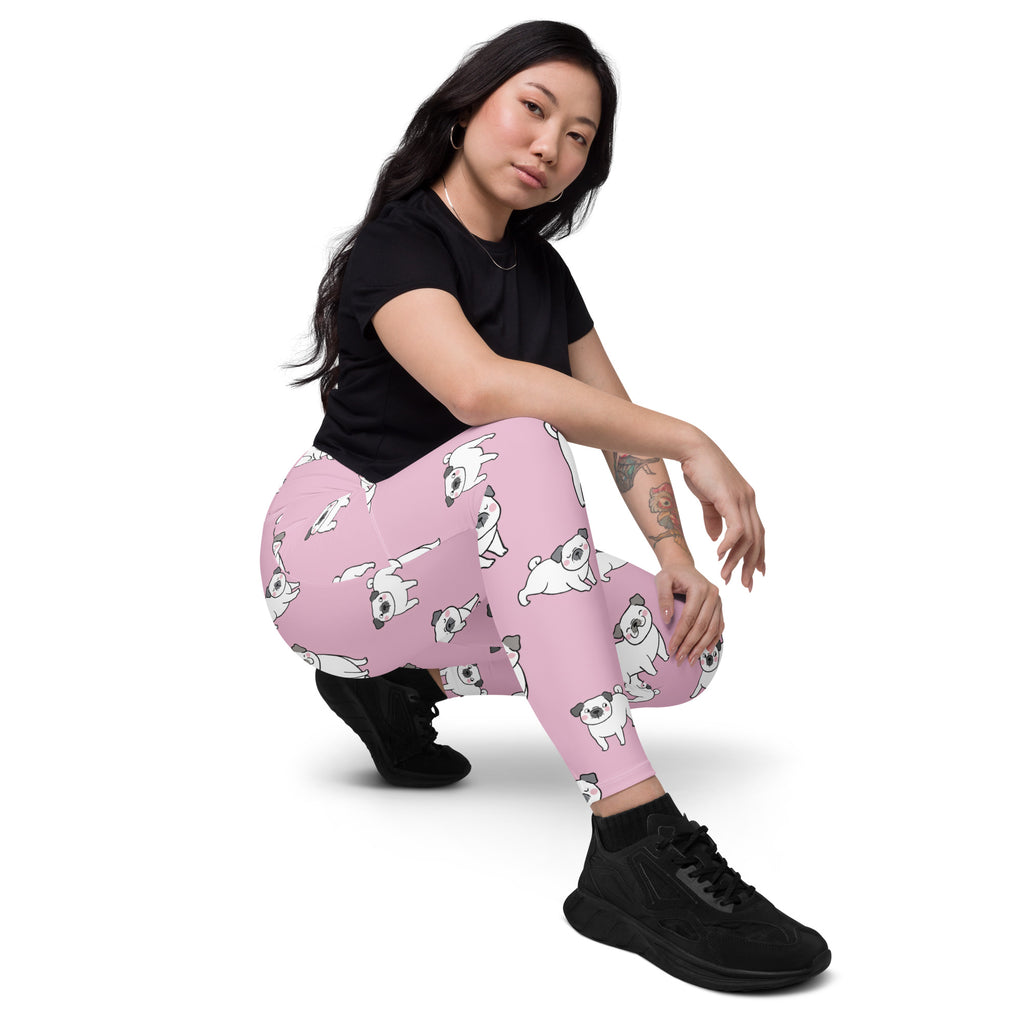 Women’s pink pug yoga leggings with pockets featuring white pug dog pattern in soft compression fabric for active wear