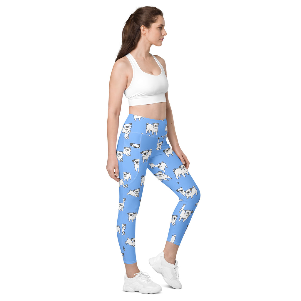 Women’s light blue high-waisted yoga leggings with soft compression and white cartoon pug pattern with pockets