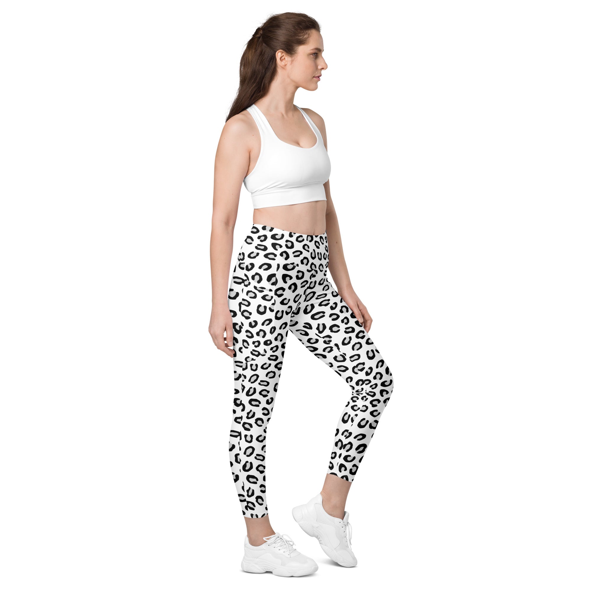 White and black leopard-print women’s high-waisted yoga leggings with pockets and soft compression fabric