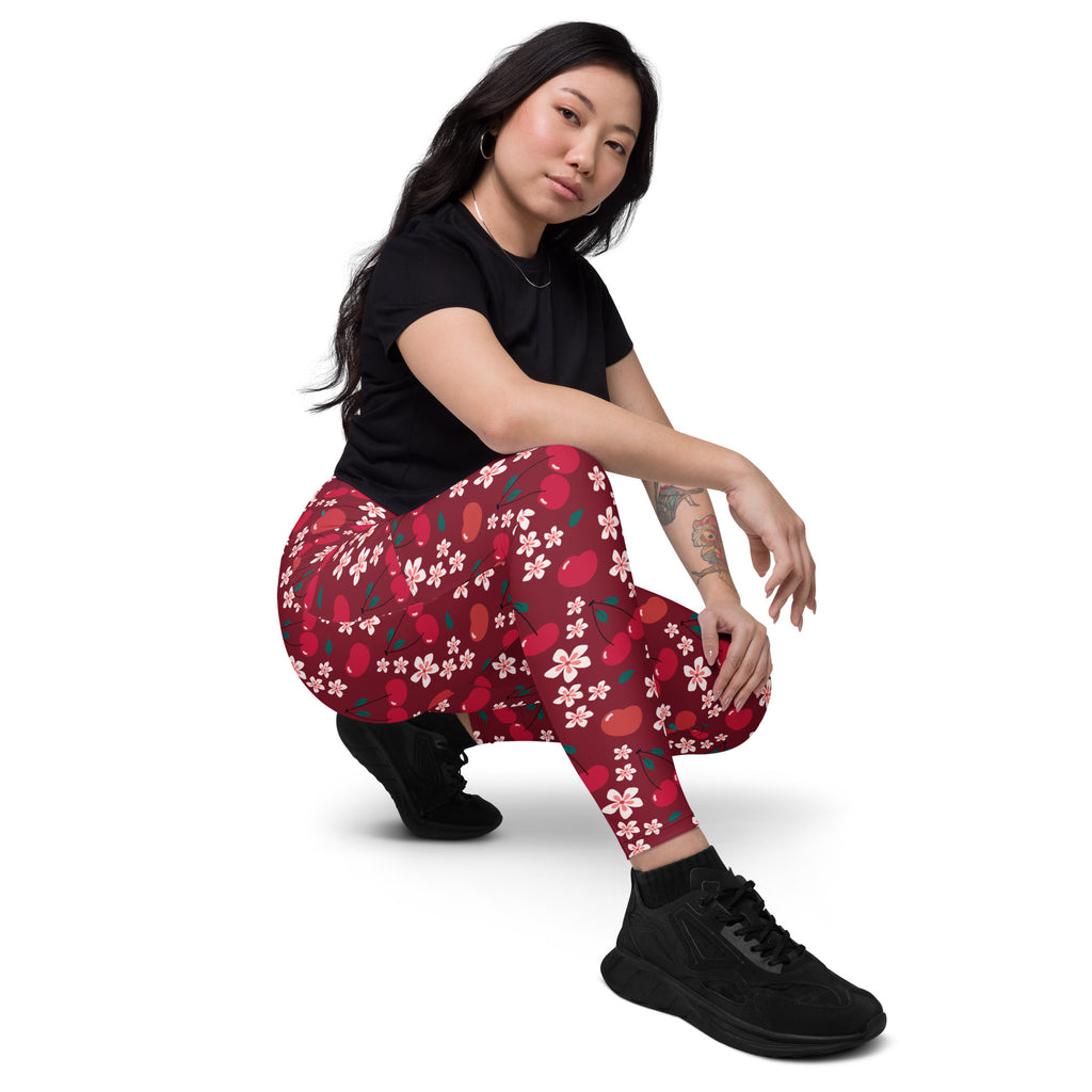 Women’s high-waisted red cherry blossom yoga leggings with floral and fruit pattern and pockets for active wear