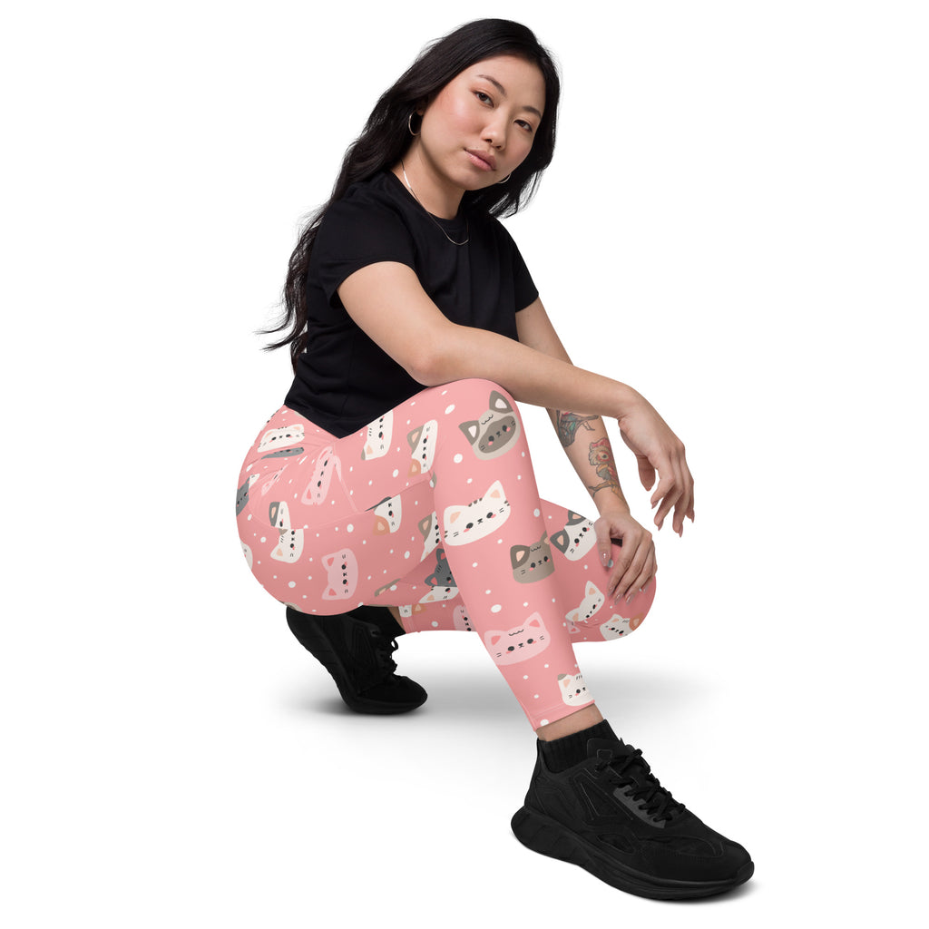Women’s high-waisted pink cat faces yoga leggings with pockets featuring soft compression and playful gray and white cats