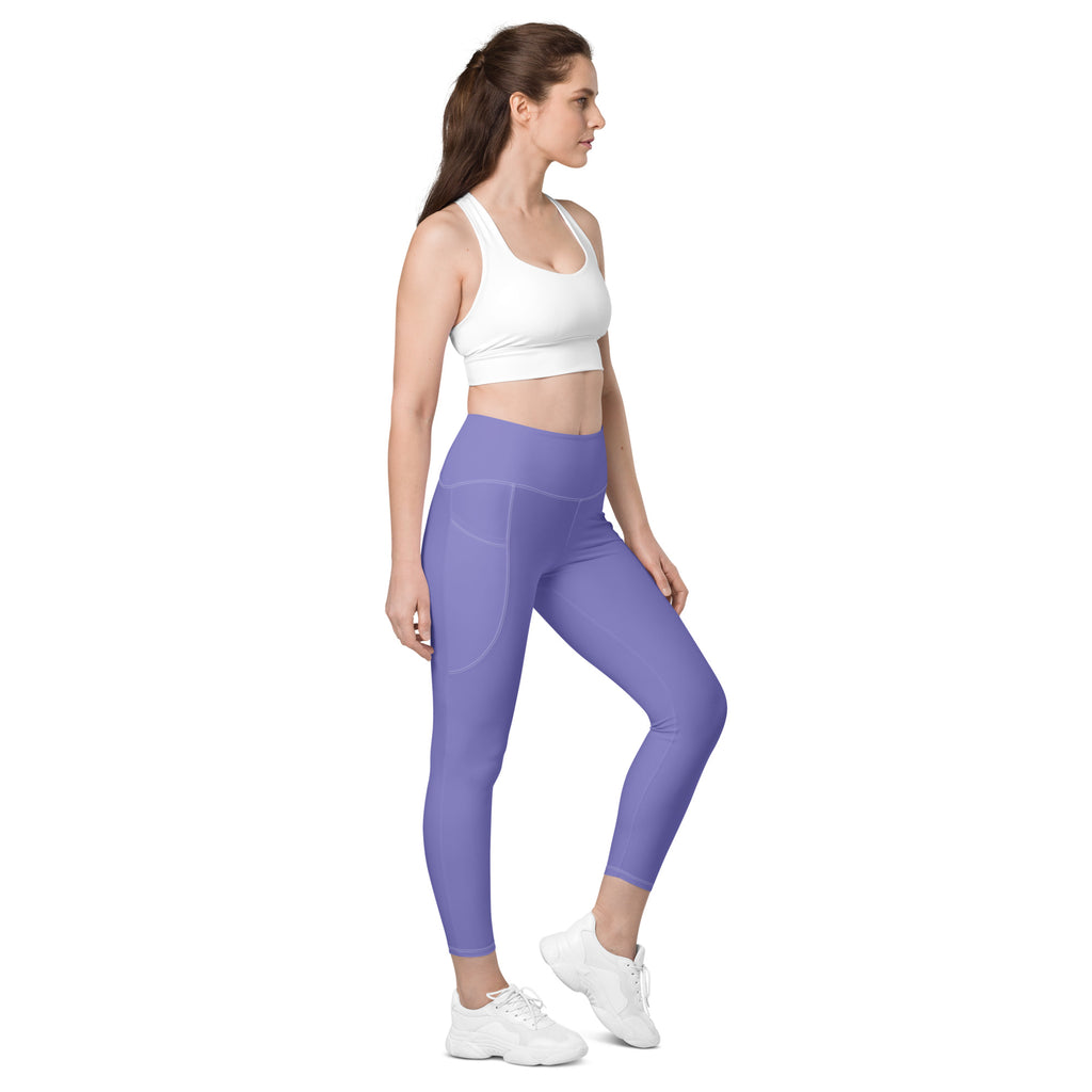 Women’s lavender high-waisted yoga leggings with pockets featuring a sleek, form-fitting design and soft compression fabric