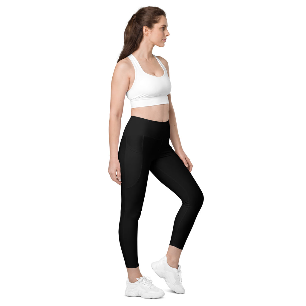 Women’s black high-waisted yoga leggings with pockets made of smooth seamless soft compression material