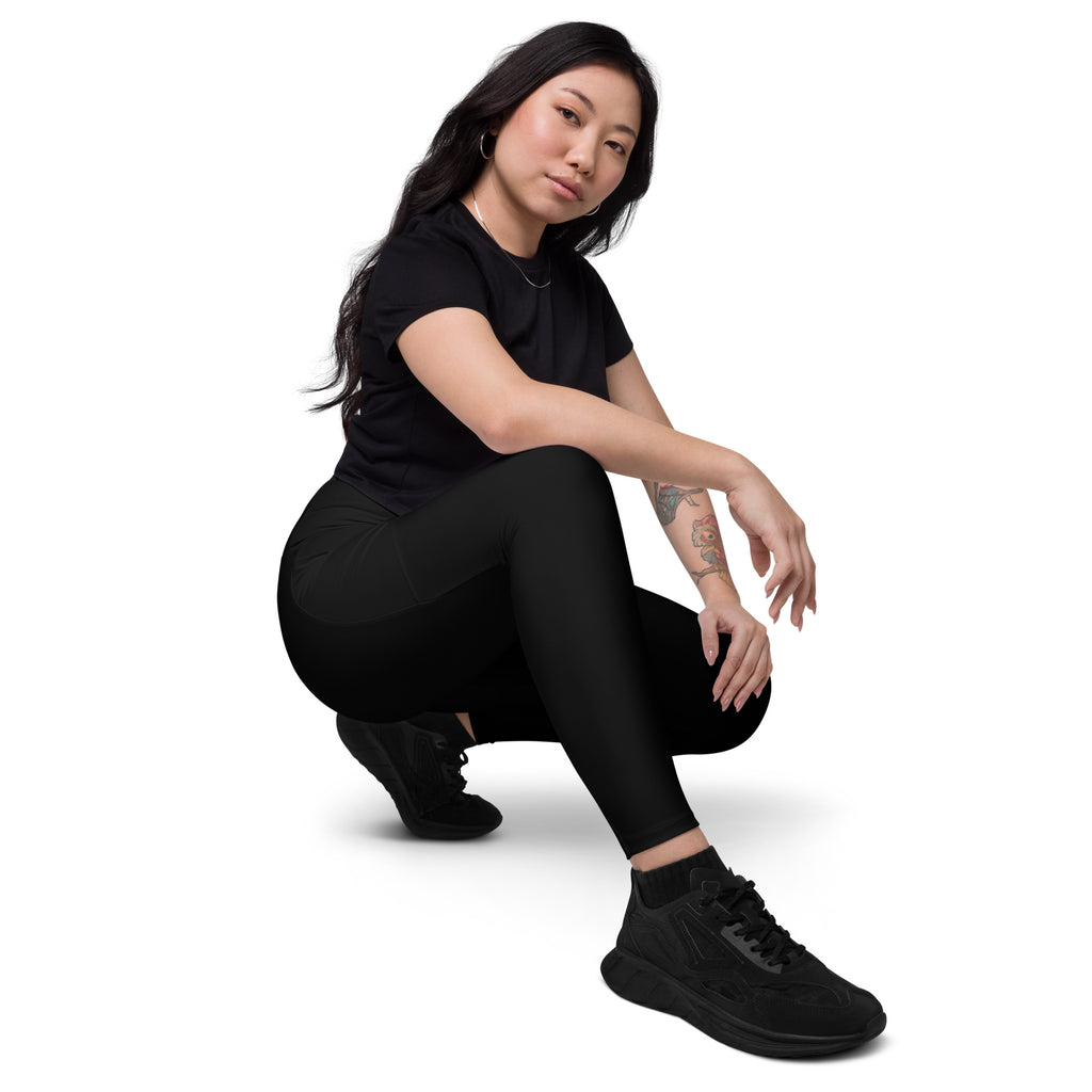 Black high-top sneakers with a sleek modern design and textured upper material for women’s activewear