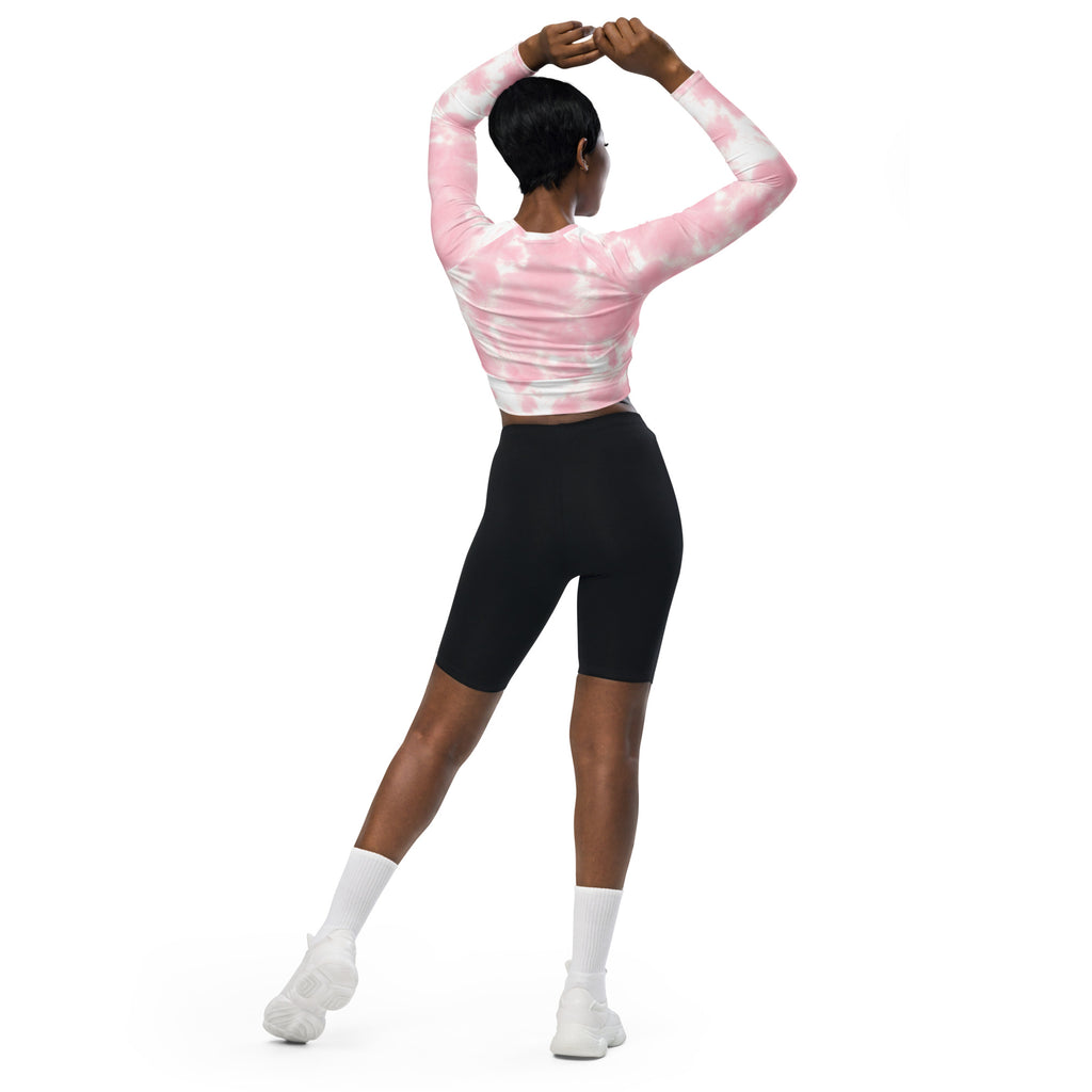 Women pink and white tie dye long sleeve fitted crop top made of stretchy performance fabric