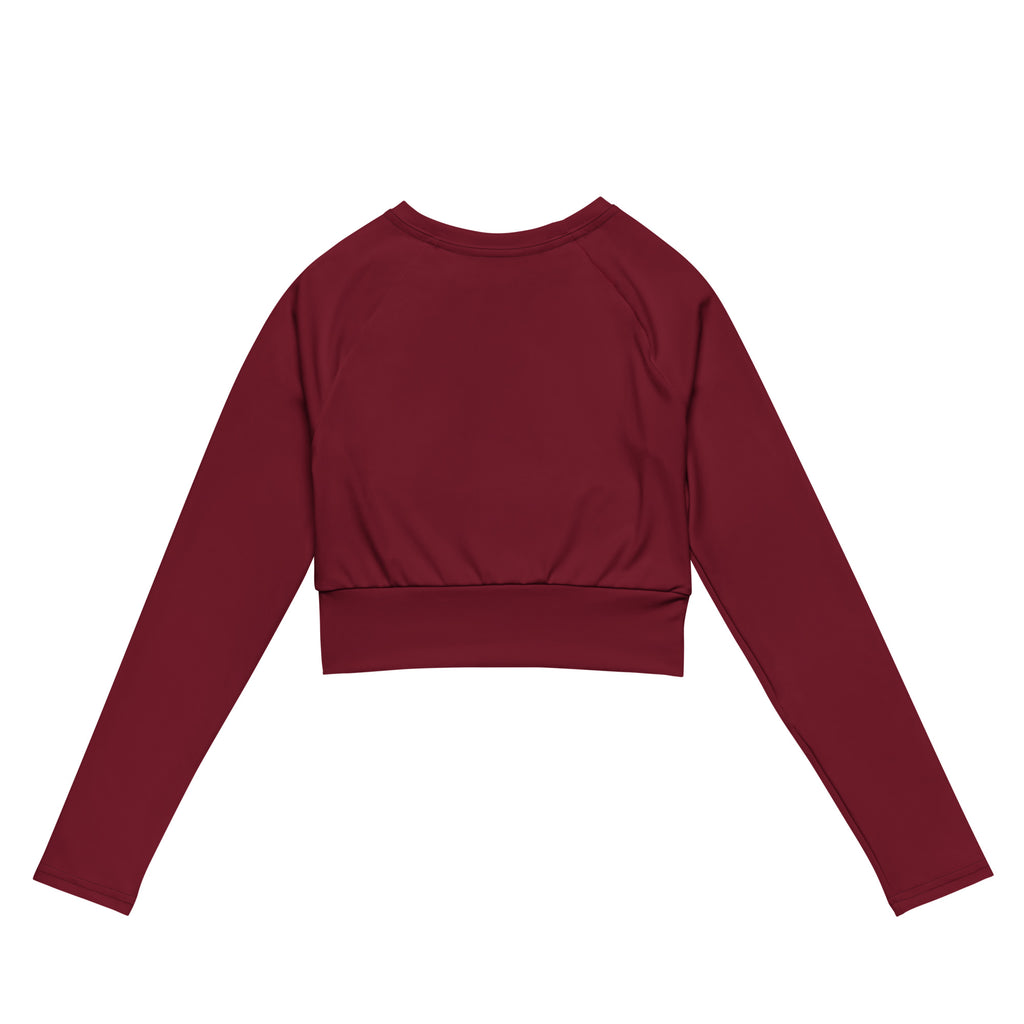 Women’s maroon long sleeve performance crop top with ribbed waistband and crew neckline in stretchy fabric