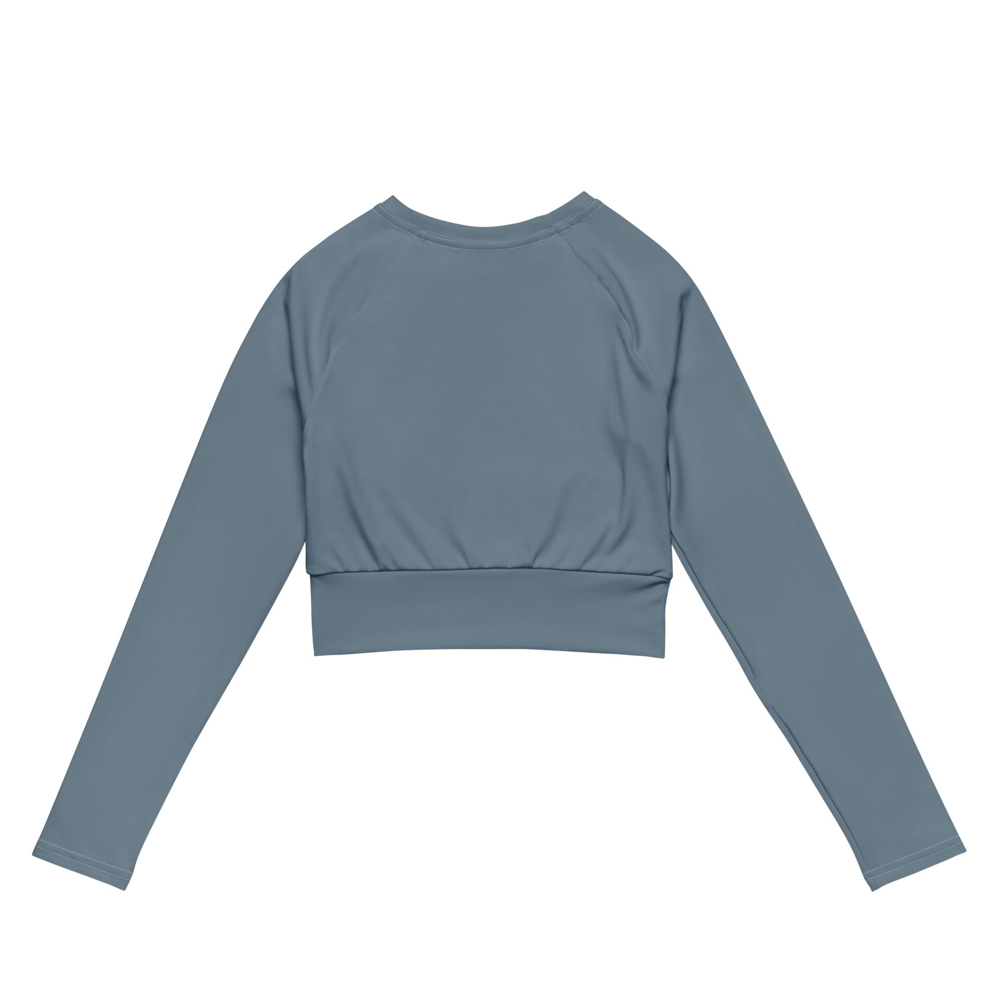 Women’s slate blue long sleeve performance crop top with fitted silhouette and ribbed waistband in muted blue