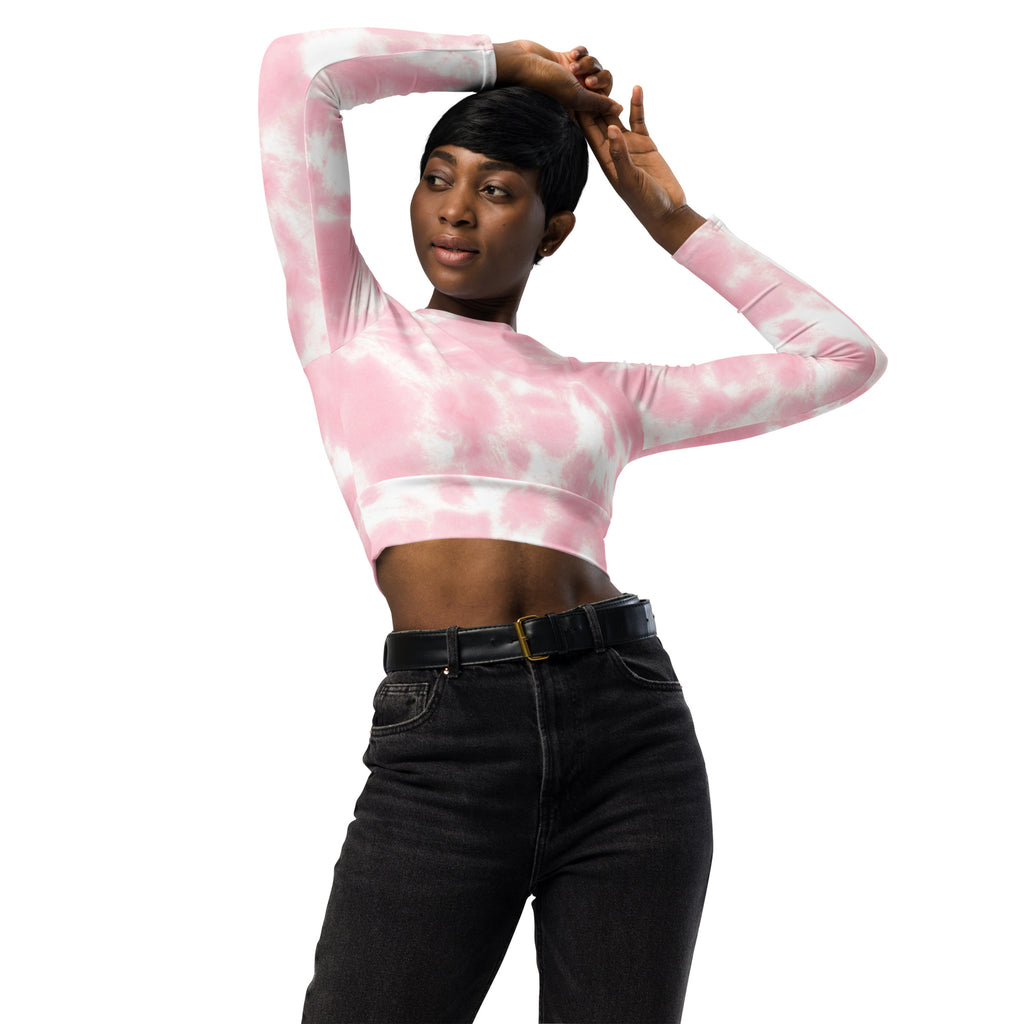 Women’s pink and white tie dye long sleeve performance crop top made of breathable fabric for active wear