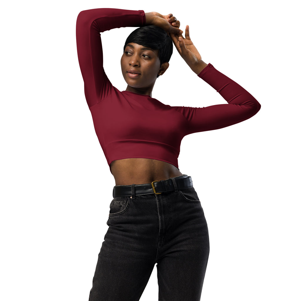 Women’s maroon long sleeve performance crop top with high neckline fitted stretchy fabric for activewear