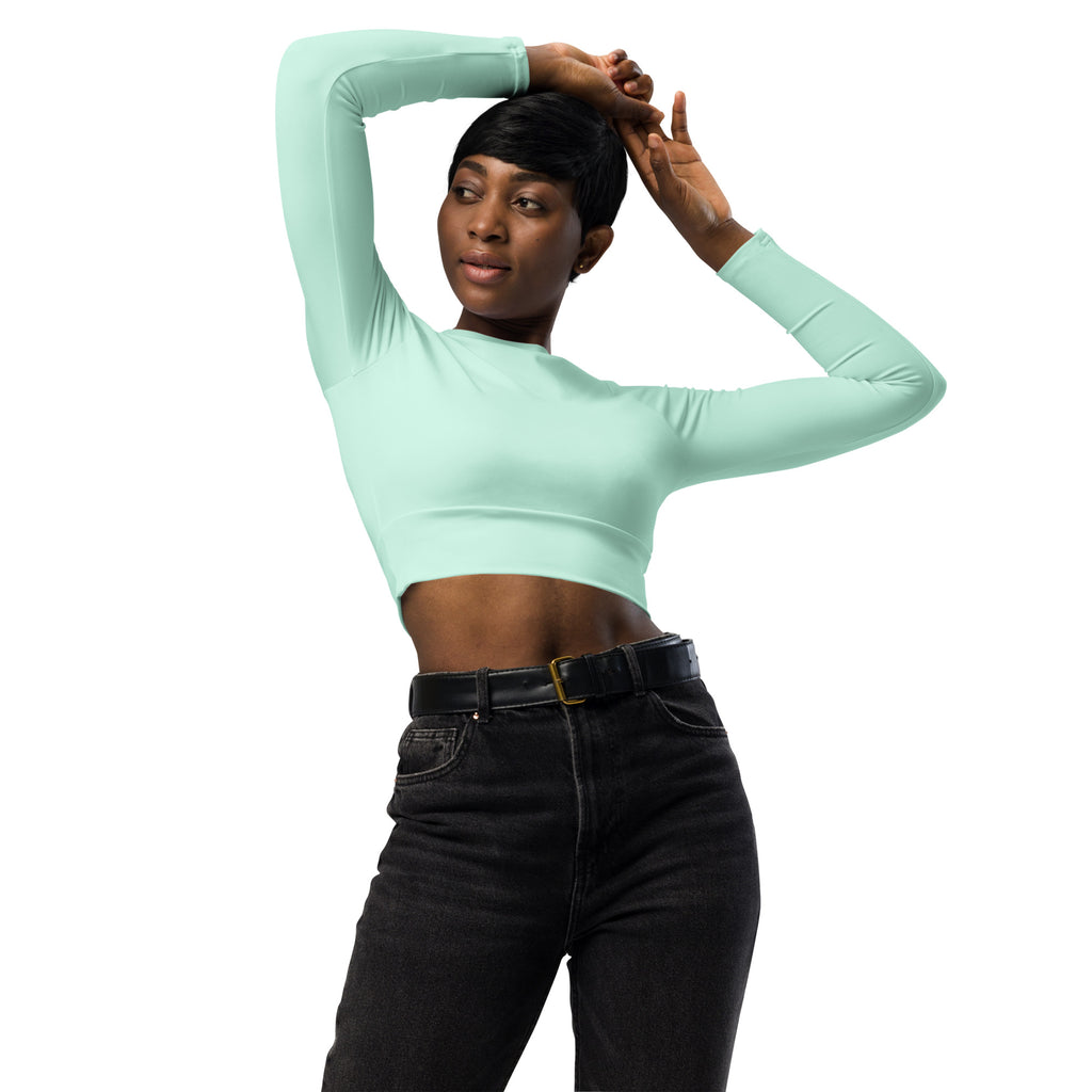 Women’s mint green long sleeve performance crop top made from breathable fabric for activewear use