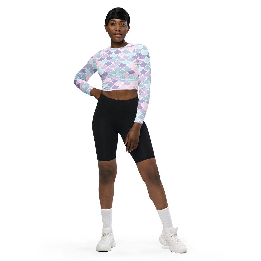 Women’s pastel mermaid scales long sleeve performance crop top in pink lavender and light blue with mermaid scale pattern