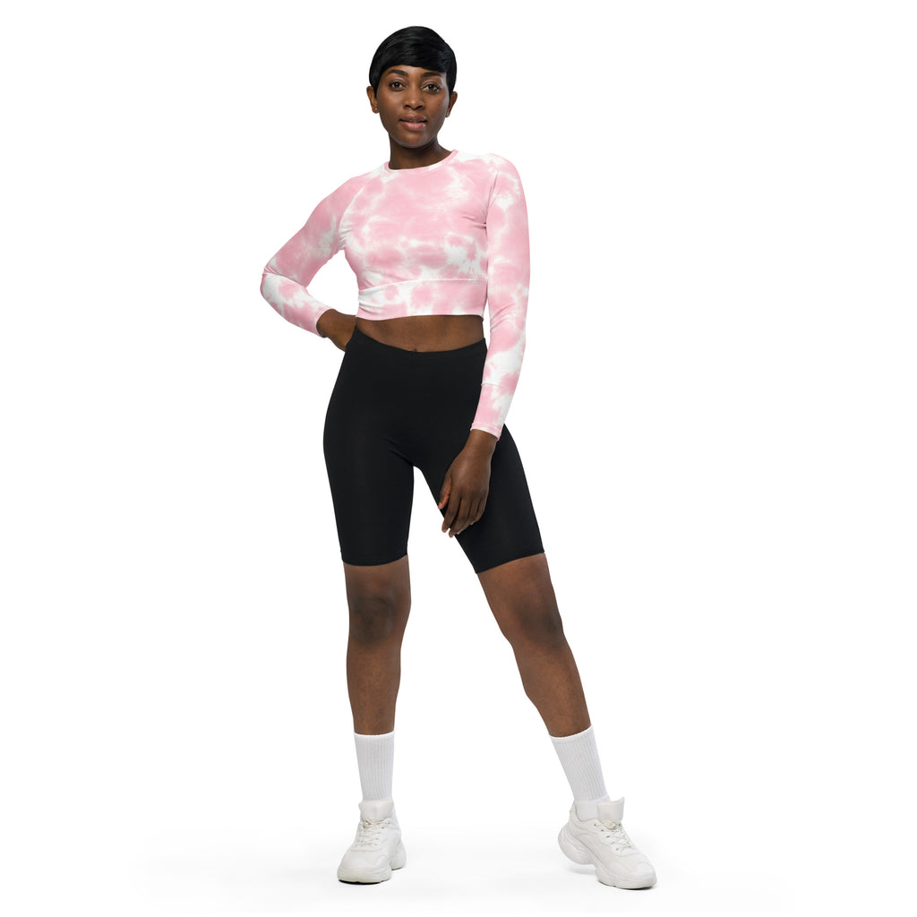 Women’s pink and white tie dye long sleeve crop top made of performance fabric for active wear