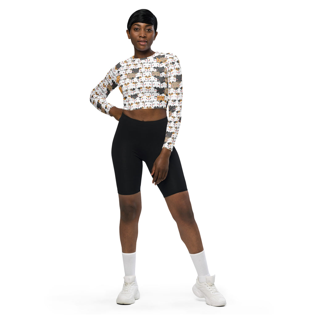 White long-sleeved performance crop top with kawaii multicolor cartoon cat faces for women