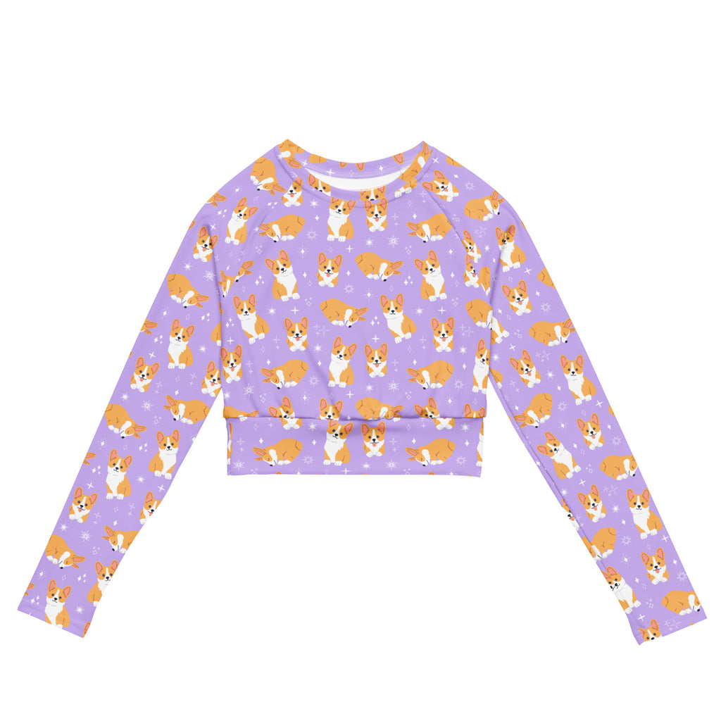 Women’s purple corgi dog long sleeve performance crop top with orange and white corgi pattern and star accents