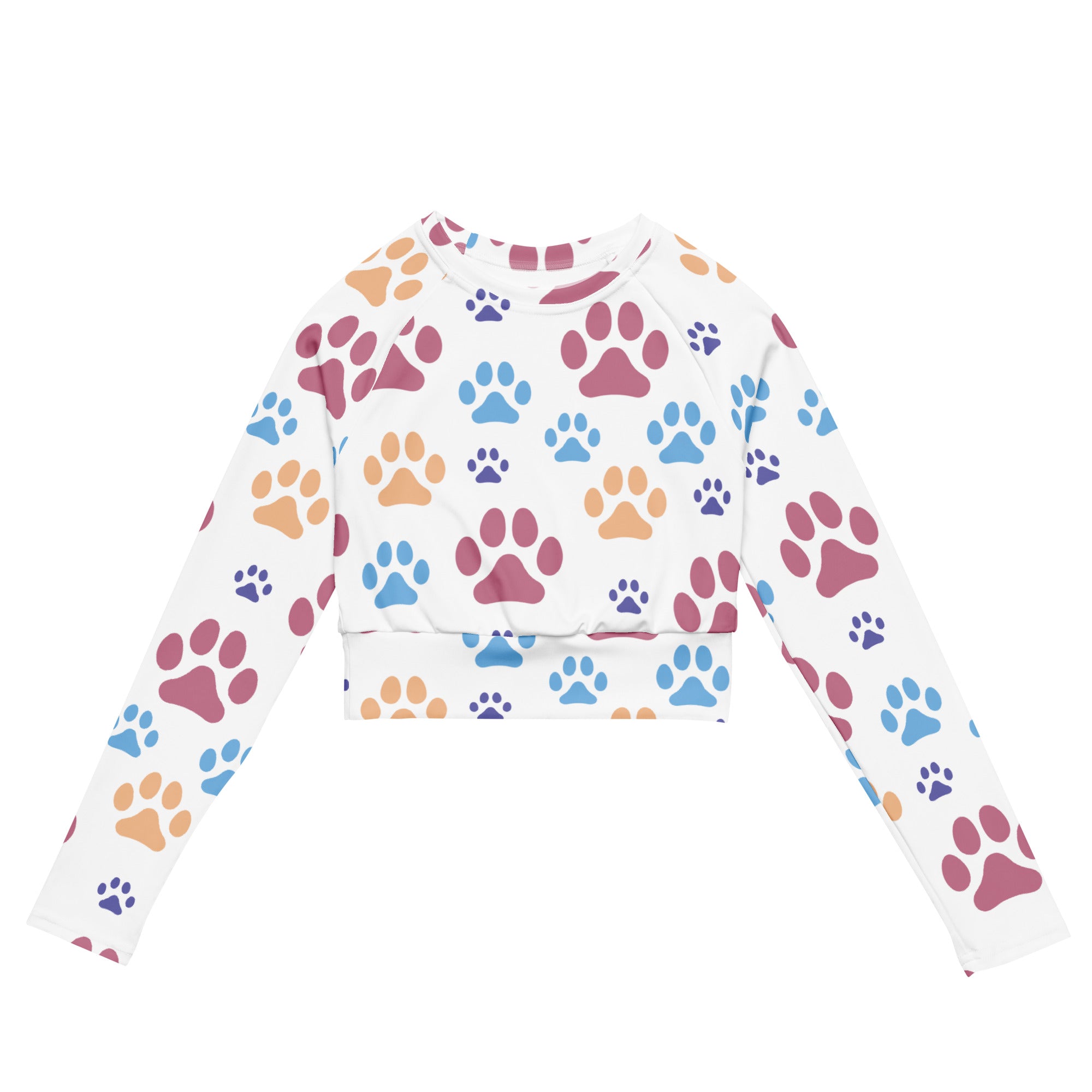 White long sleeve performance crop top with colorful pink blue and orange paw print pattern for women