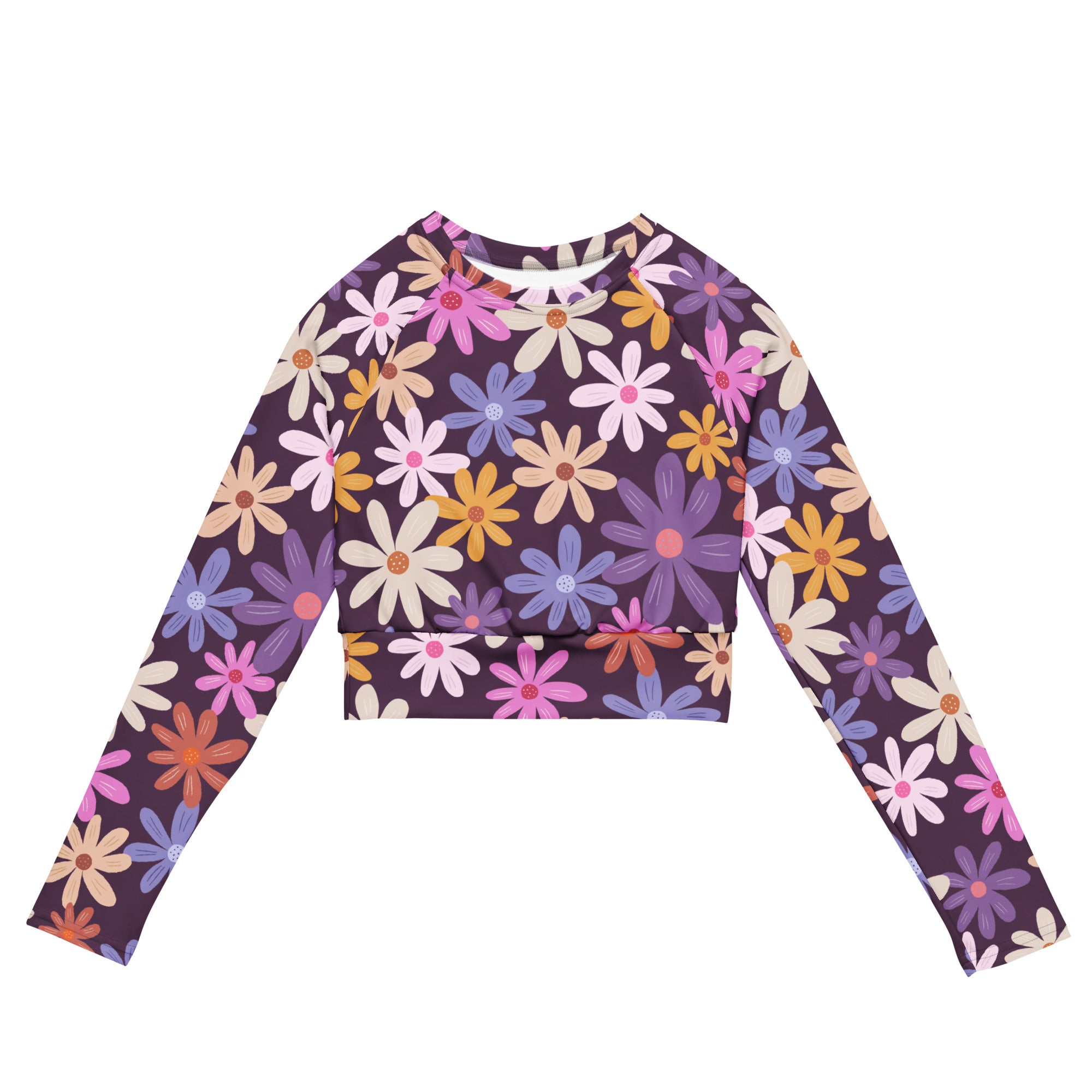 Women’s purple floral long sleeve performance crop top with vibrant pink purple yellow and white daisies on deep purple background